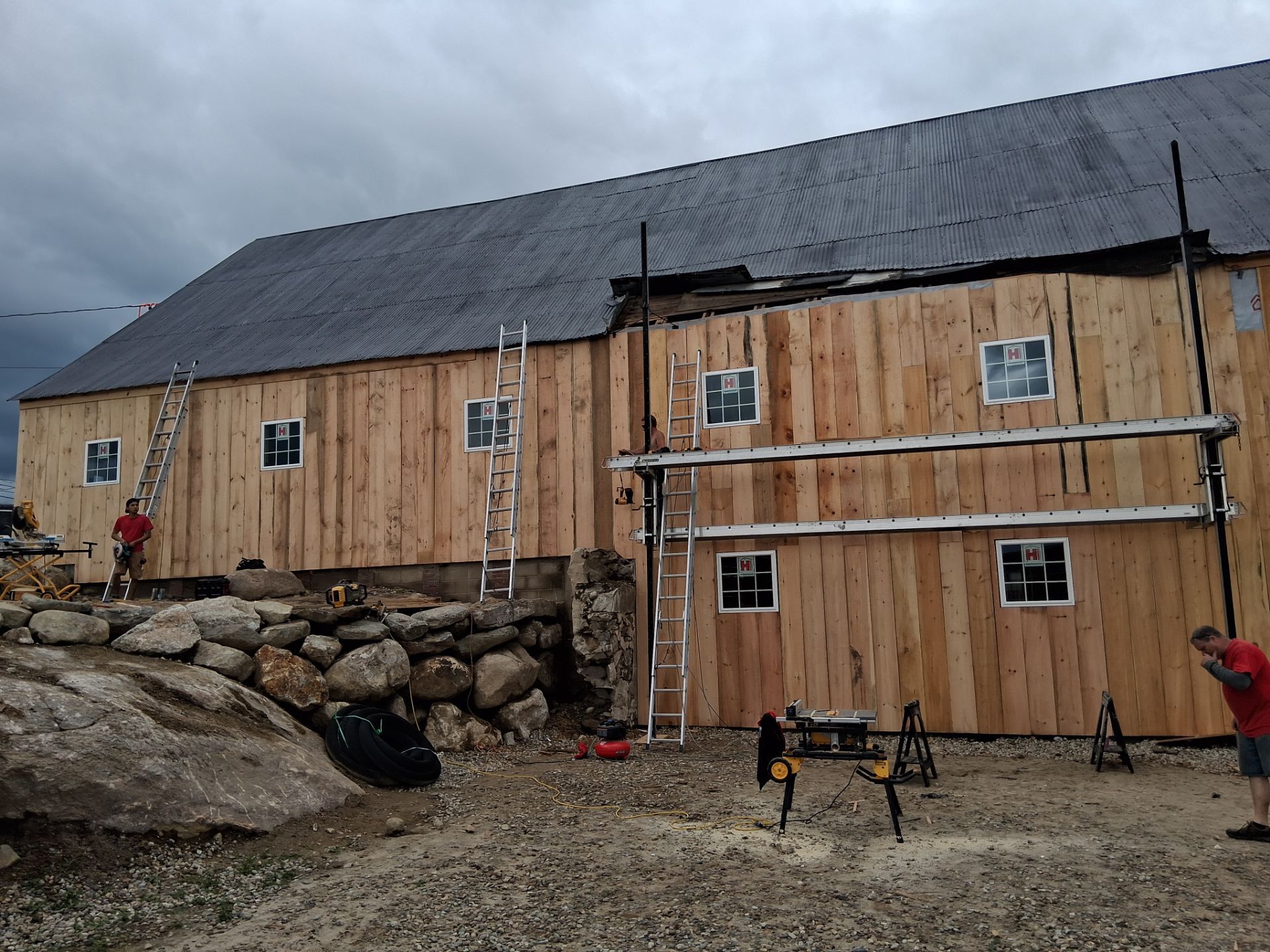 Barn Restoration and Board-and-Batten Siding Installation in Hansons Ridge by B's Roofing & Construction LLC