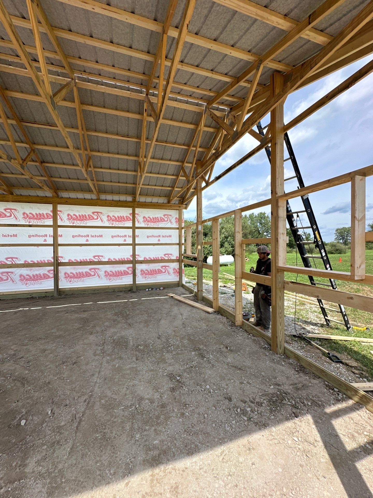 Custom Post-Frame Pole Barn with Concrete Floor in Greenfield by The Barn Builders