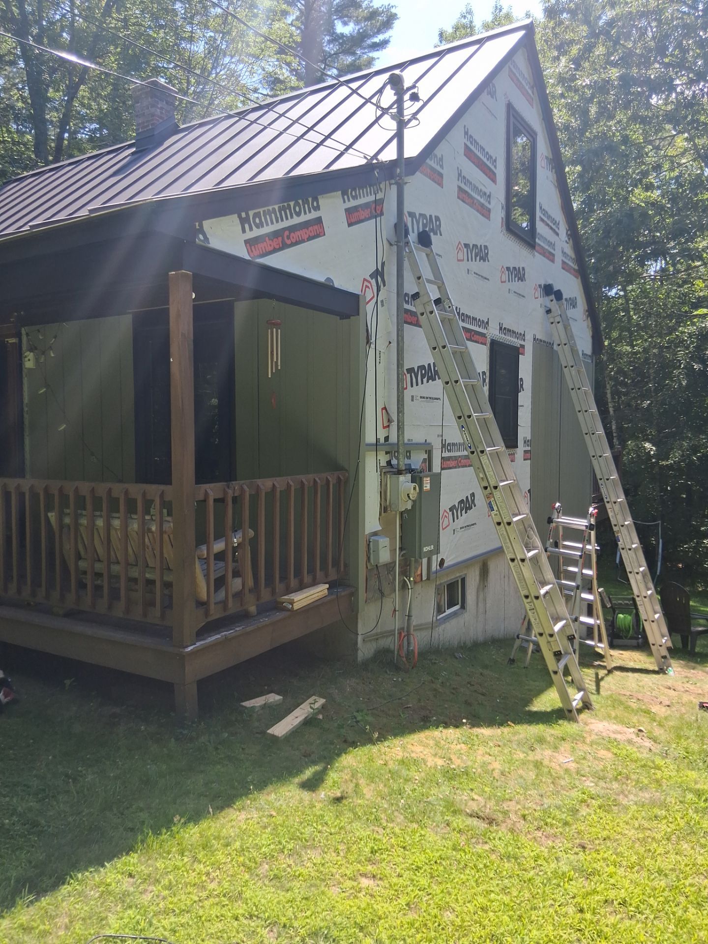 Sage Green Board and Batten Siding and Deck Upgrade in Standish by Tall pine roofing
