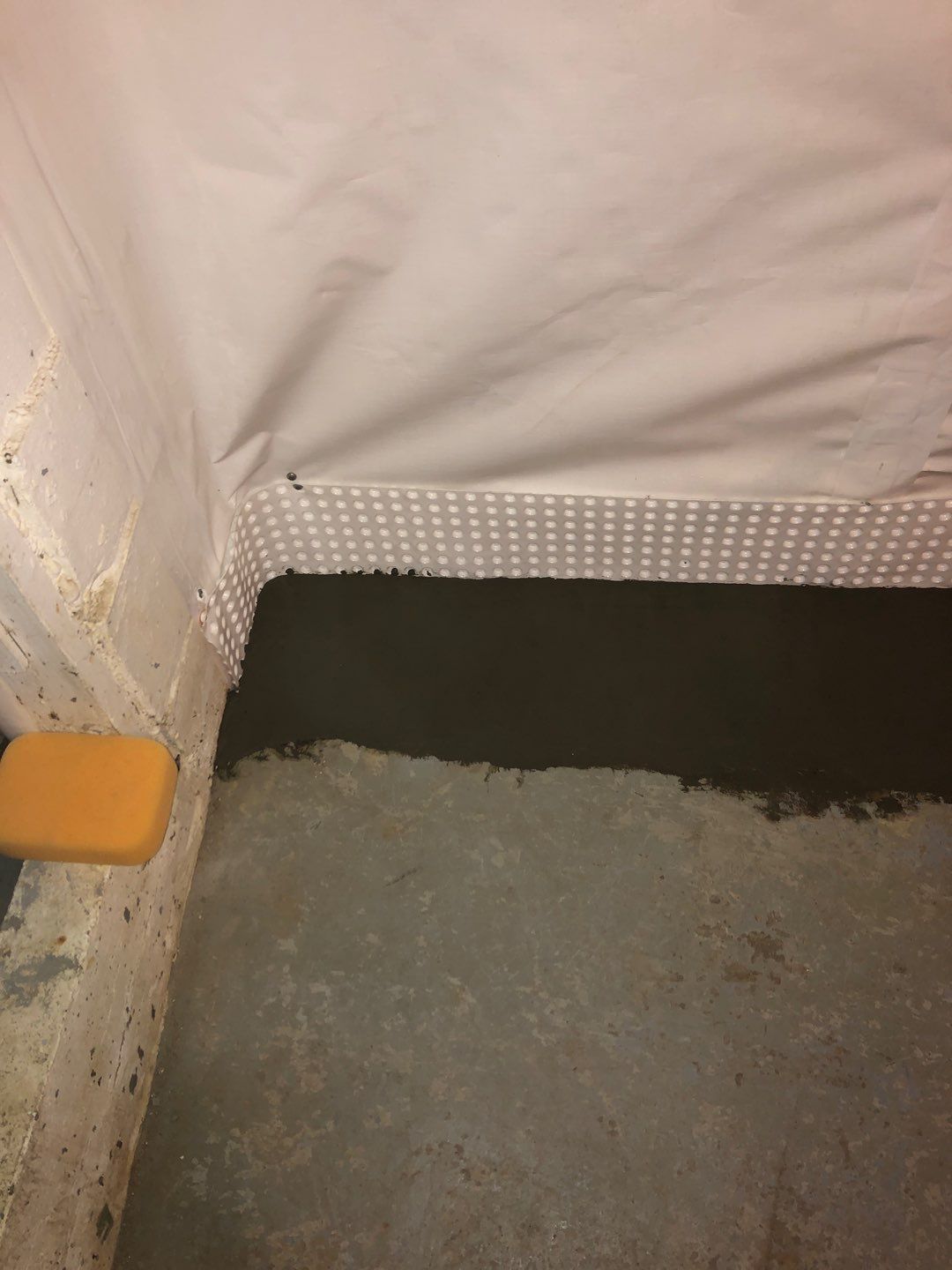 Basement Waterproofing using Drain tile system and a foundation wrap by ACE Waterproofing & Basement Solutions