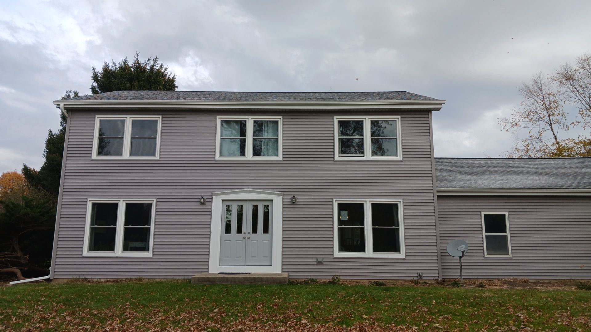 New Siding and Windows by NextWave Construction