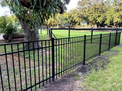 Aluminum Fence Installation using 3 Rail Aluminum Fence and 4Ft High Wood Labor