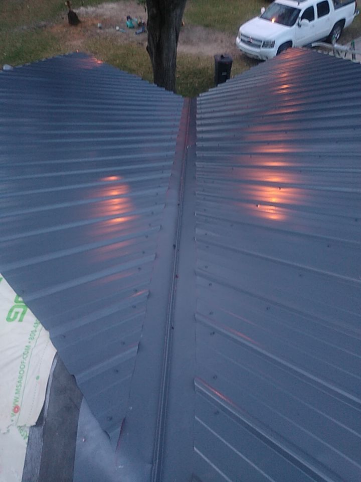 Residential Roofing Installation using Roof Replacement by American Roofing & Construction LLC
