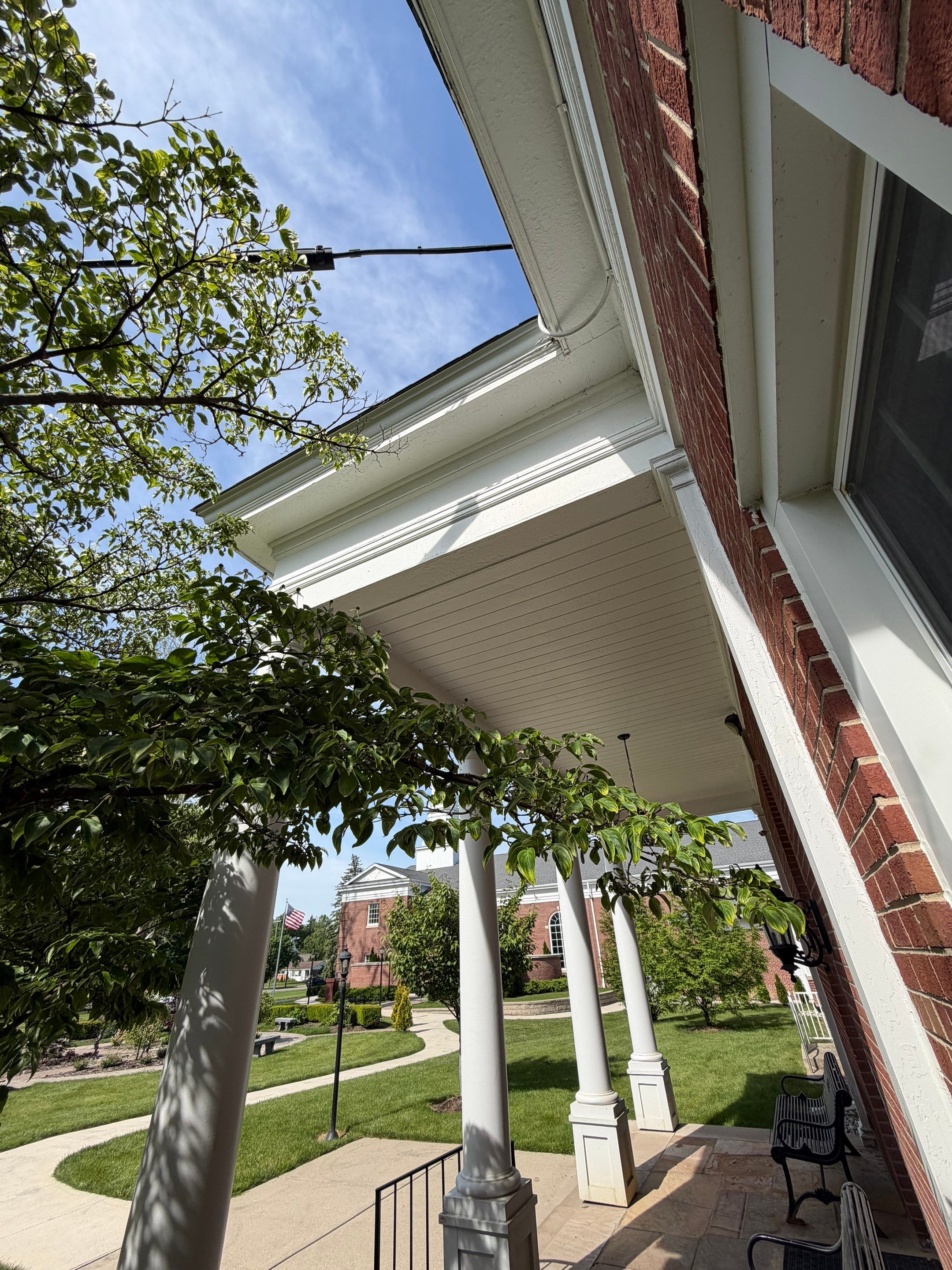 Commercial Wood Trim Restoration and Gutter Replacement in Birmingham by Top Shelf Painter