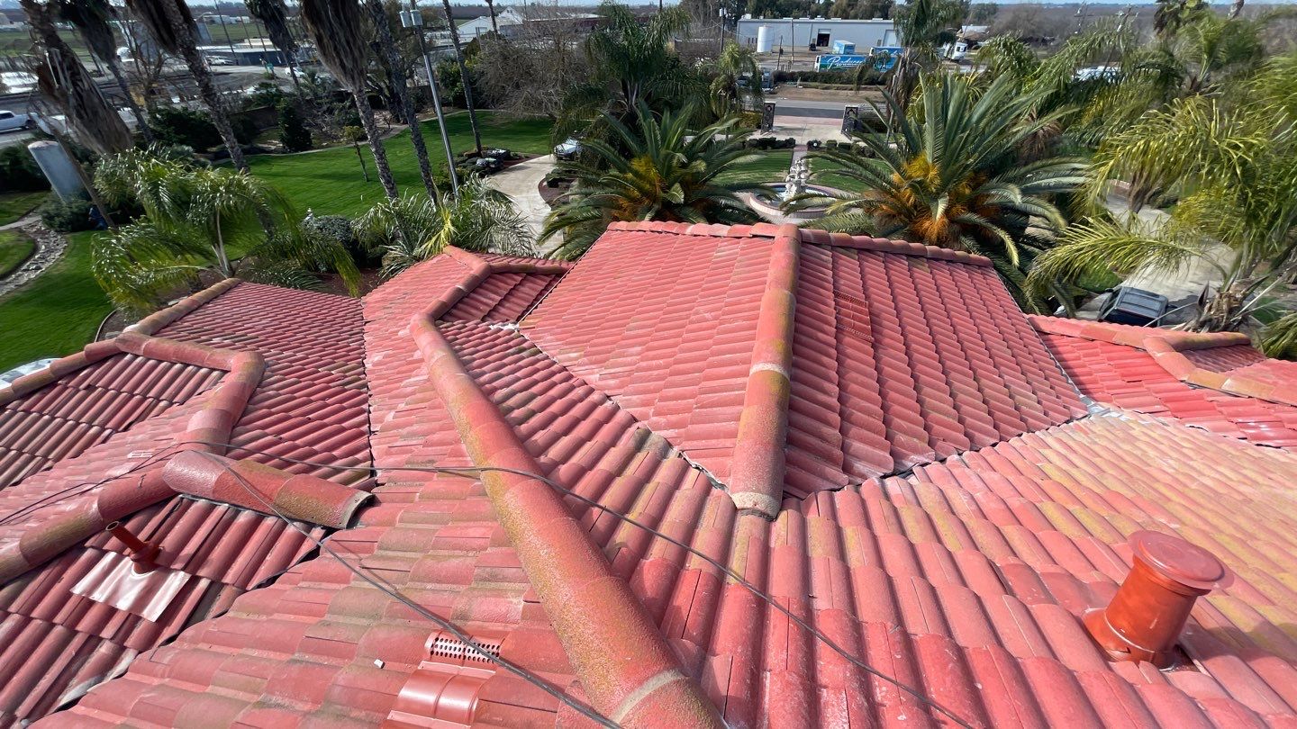 Tile refurbish project using existing tiles and replaced underlayment and battens by Straight Edge Roofing Inc