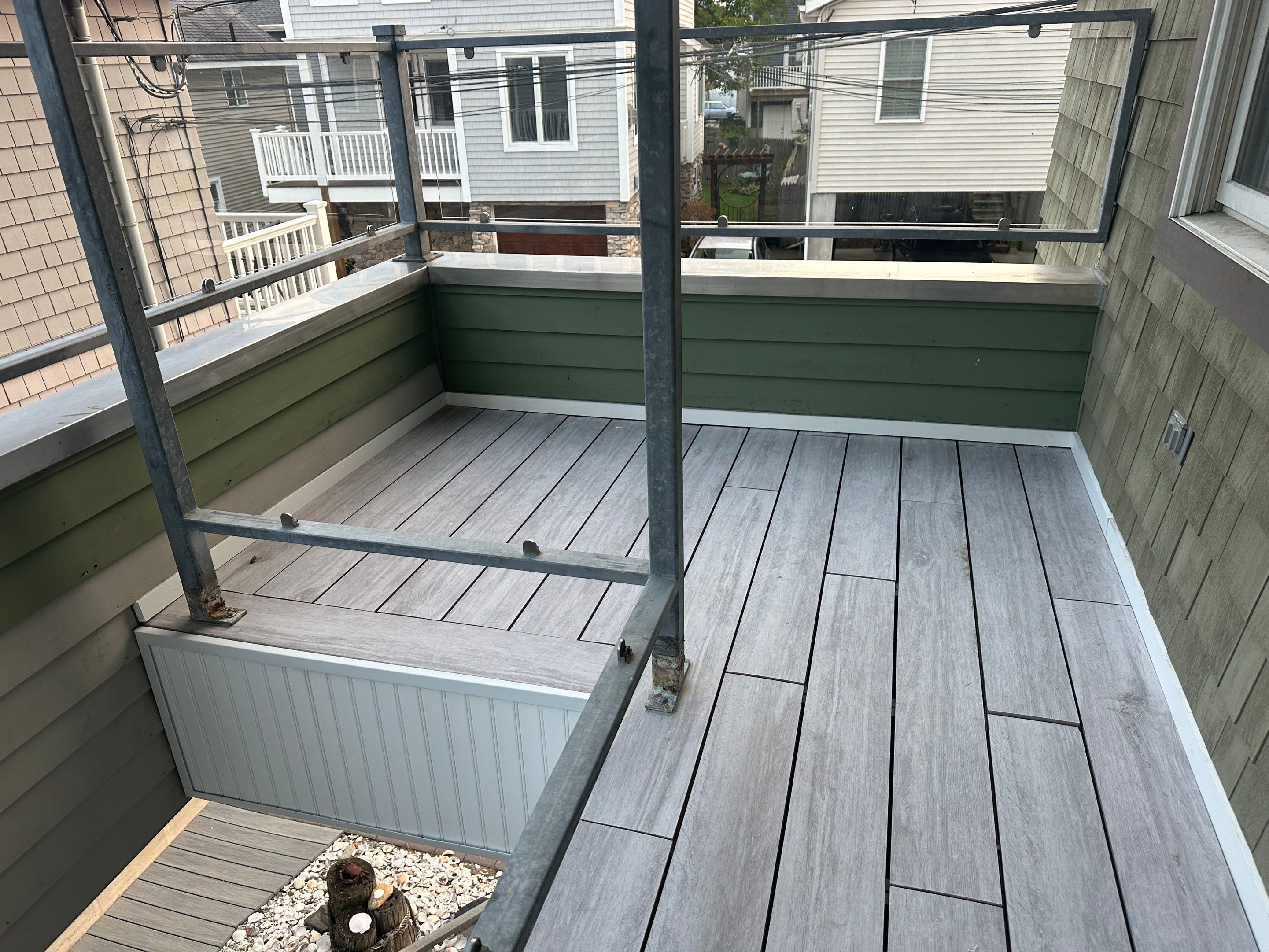 Deck Installation using Tanzite Stone Decking by A Plus Exterior