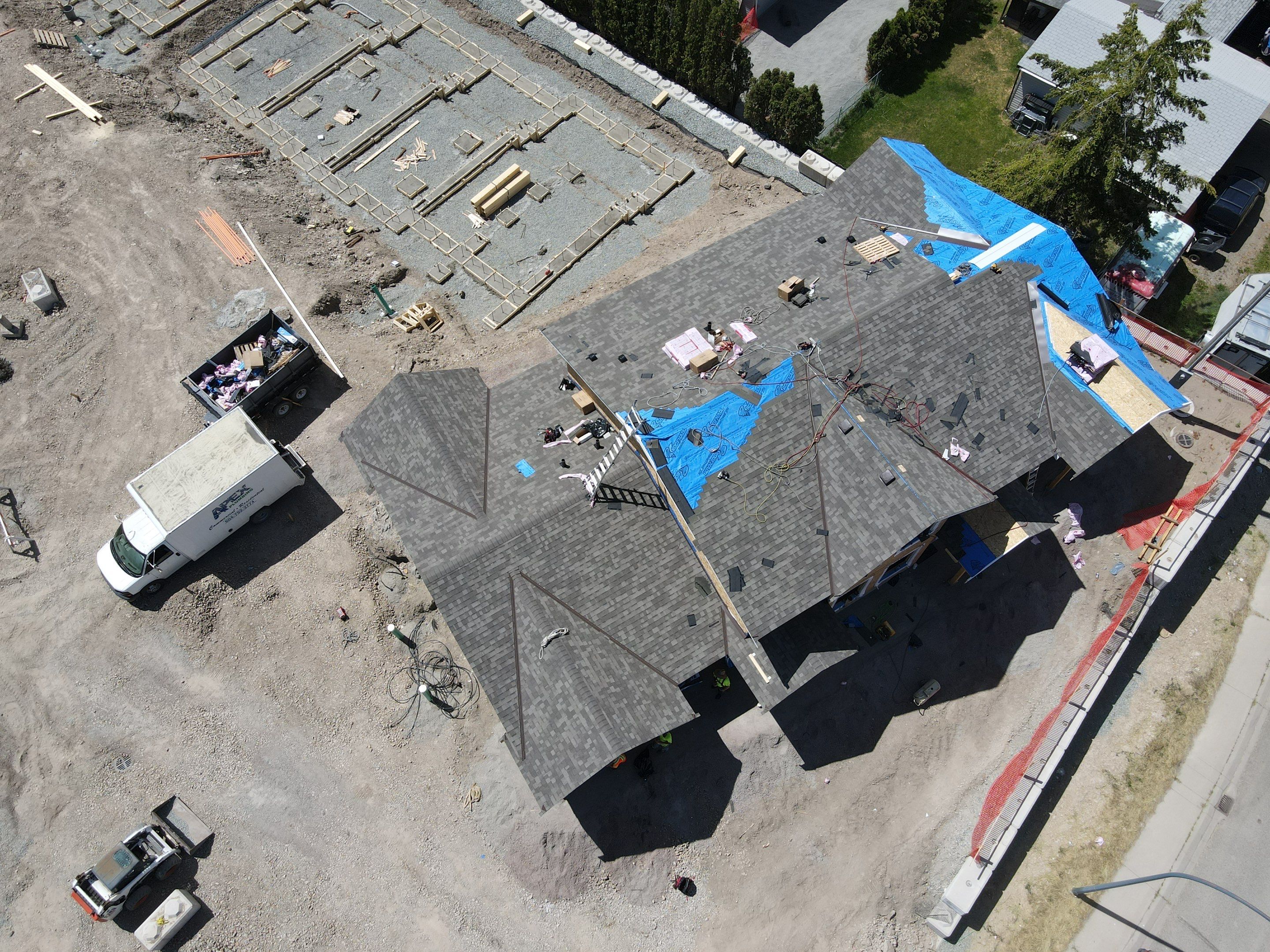 Residential Roofing Installation using OC Oakridge shingles by Top Notch Roofing Inc