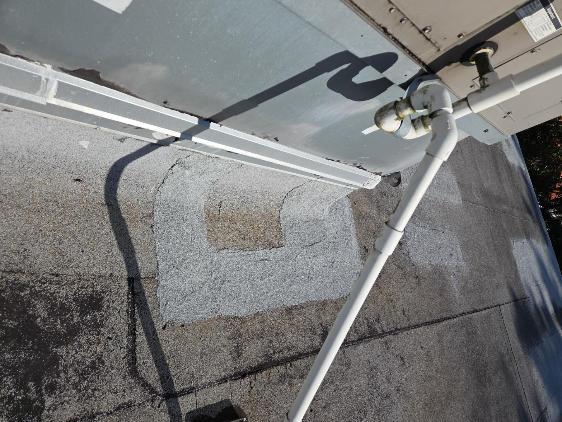 Commercial Flat Roof Restoration Using Silicone Coating in Hallandale Beach by Aastro Roofing