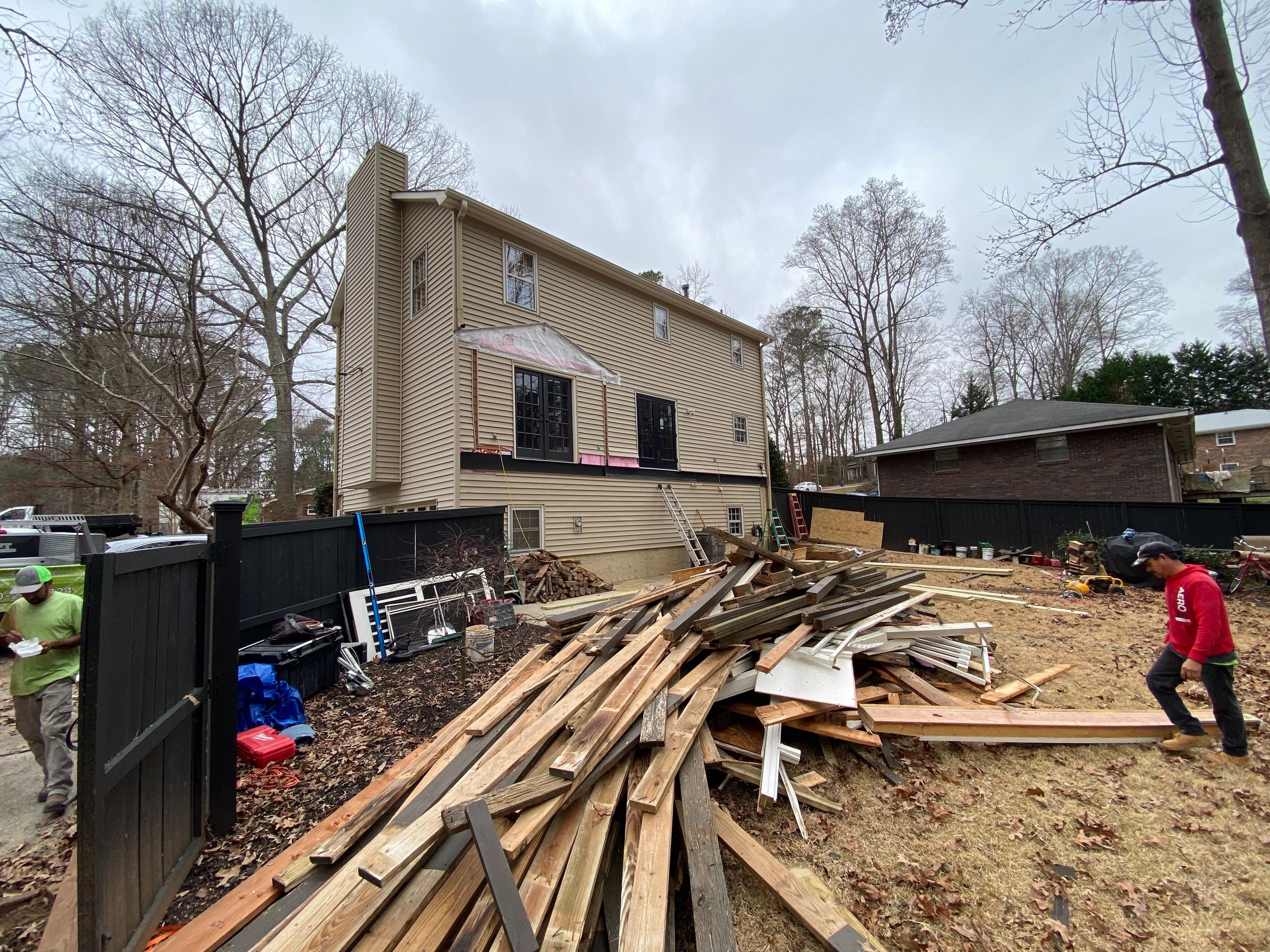 Custom Screened-In Porch and Elevated Deck Construction in Smyrna by Swift Home Renovations