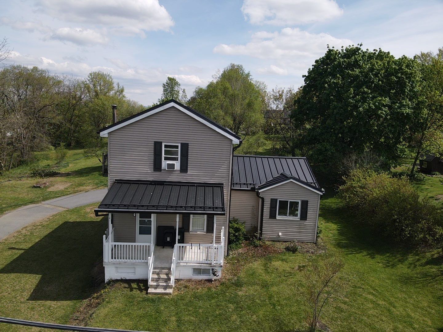 Residential Roofing Installation using Texture Standing Seam by Teflon Roofing