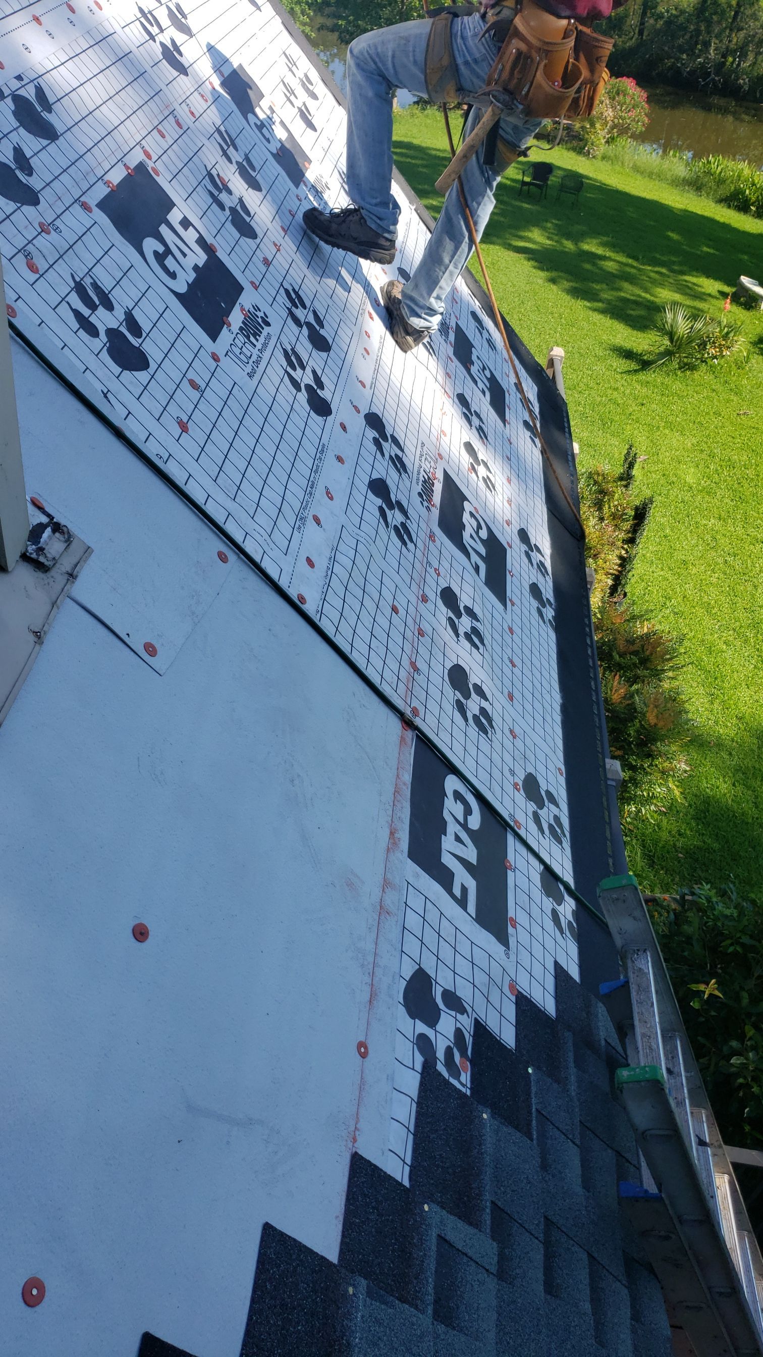 Residential Roofing Installation using Roof Replacement by American Roofing & Construction LLC