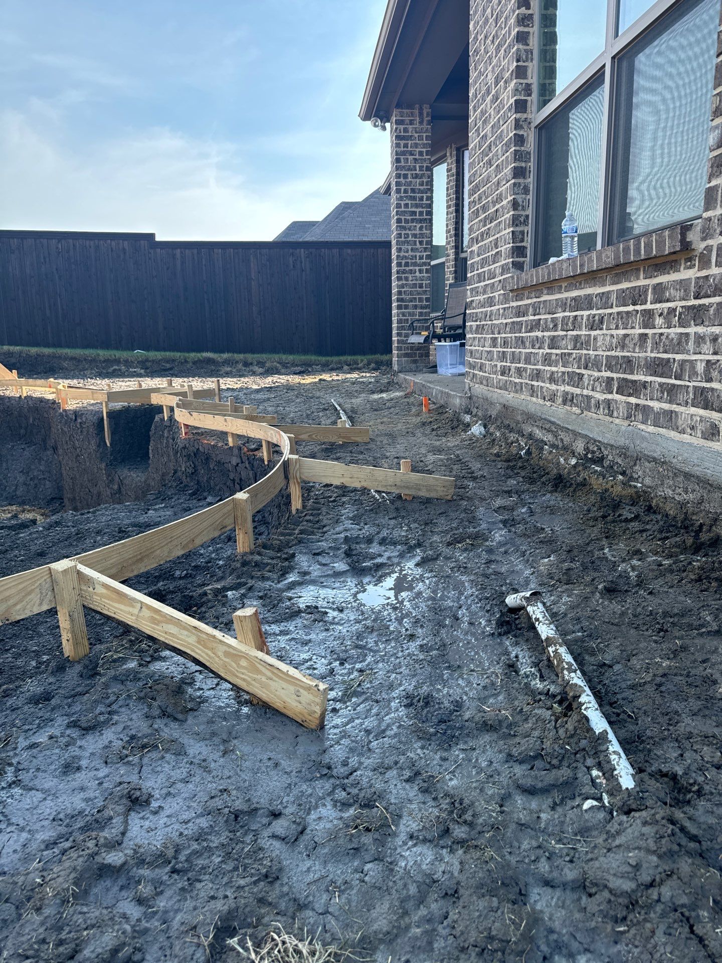 Freeform Pool with Raised Stone Spa by Pinnacle Pools and Spas - DFW