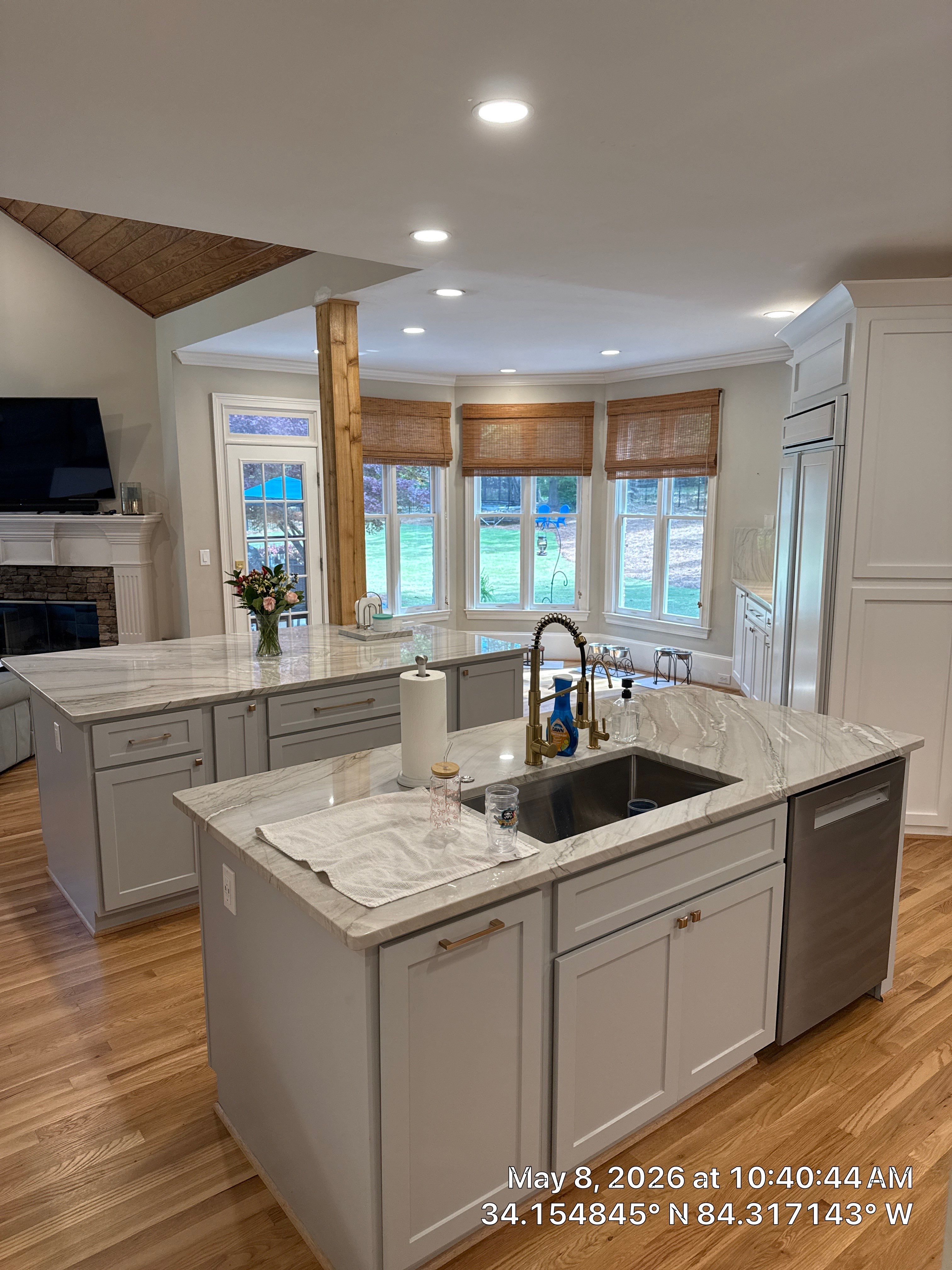 Alpharetta Kitchen Remodel Featuring Double Islands and White Quartz by Heart & Home Kitchen & Bath Remodeling LLC