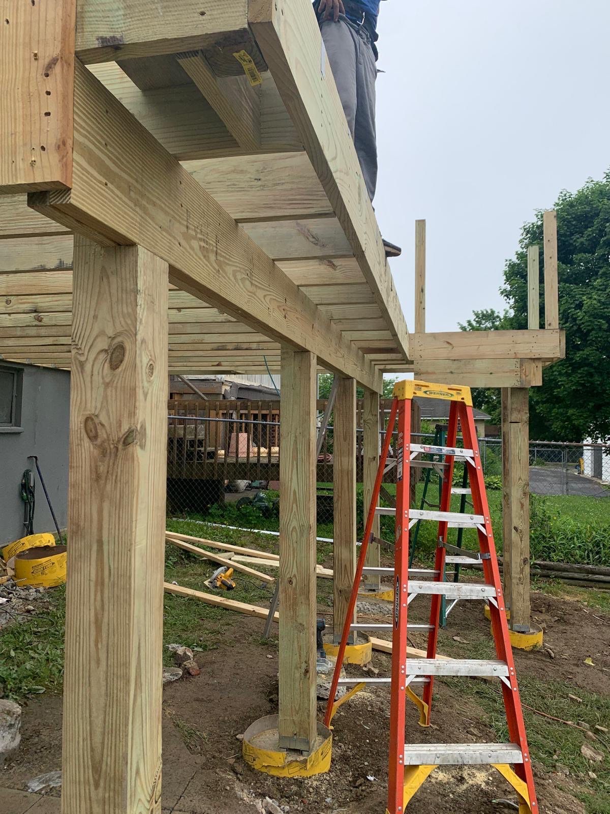 Pressure-Treated Wooden Staircase and Concrete Footing Installation in Schuylkill Haven by Herts Roofing & Construction