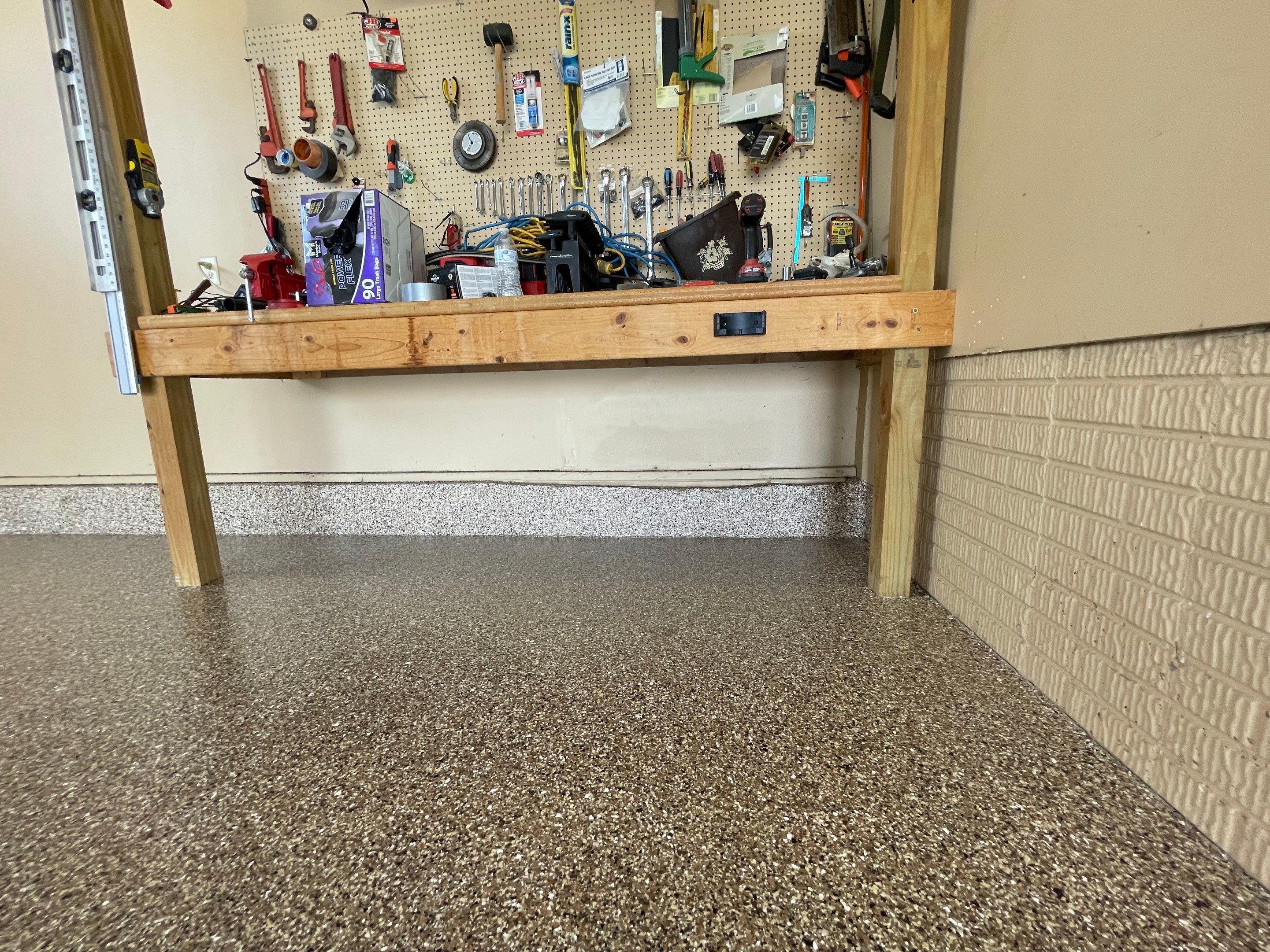Residential Garage Floor Transformation with Speckled Epoxy Coating by Select Painting, Coatings & Garage Cabinets