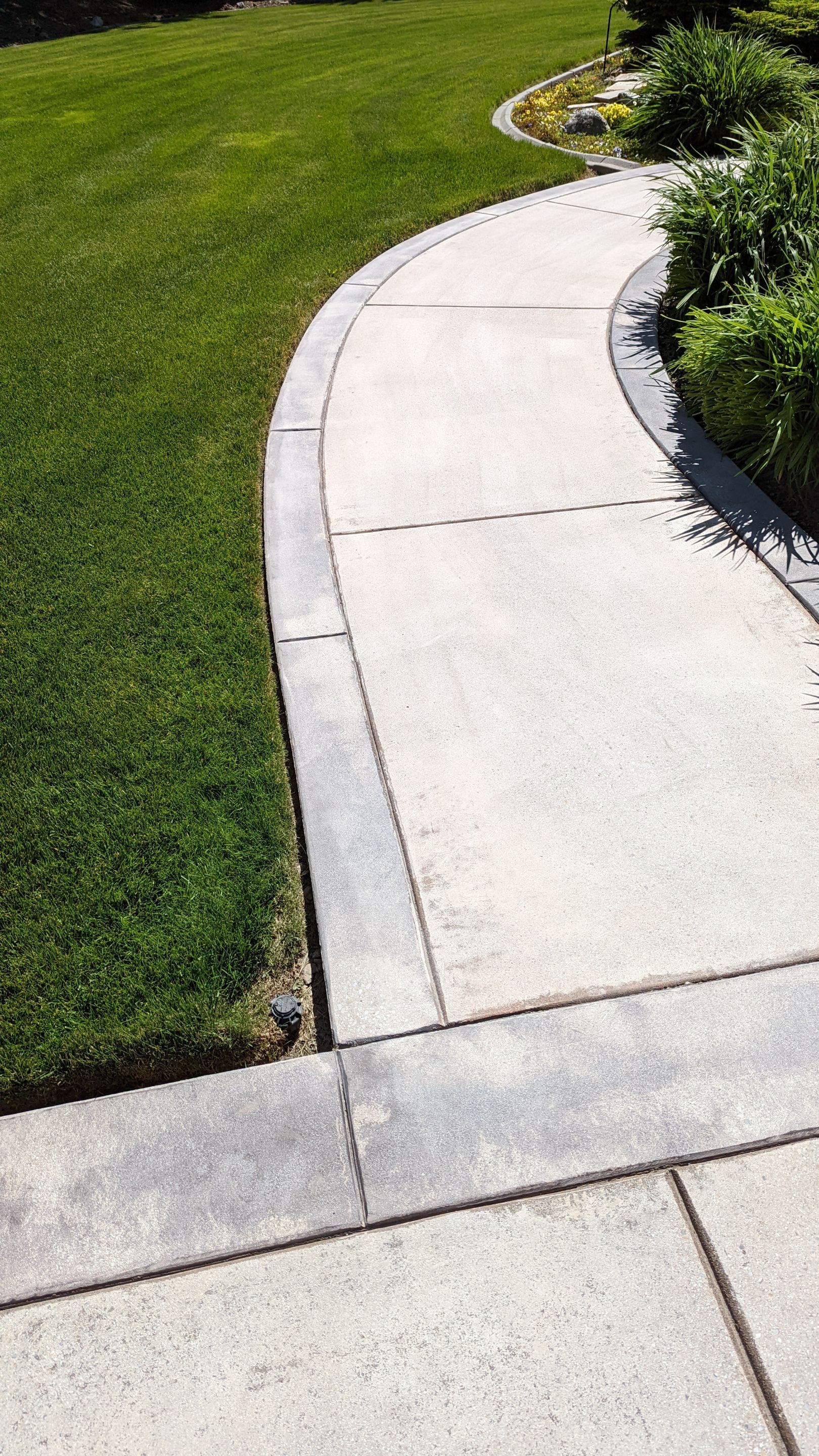 Driveway using Pecan and Chestnut Trim by Croc Coatings, LLC