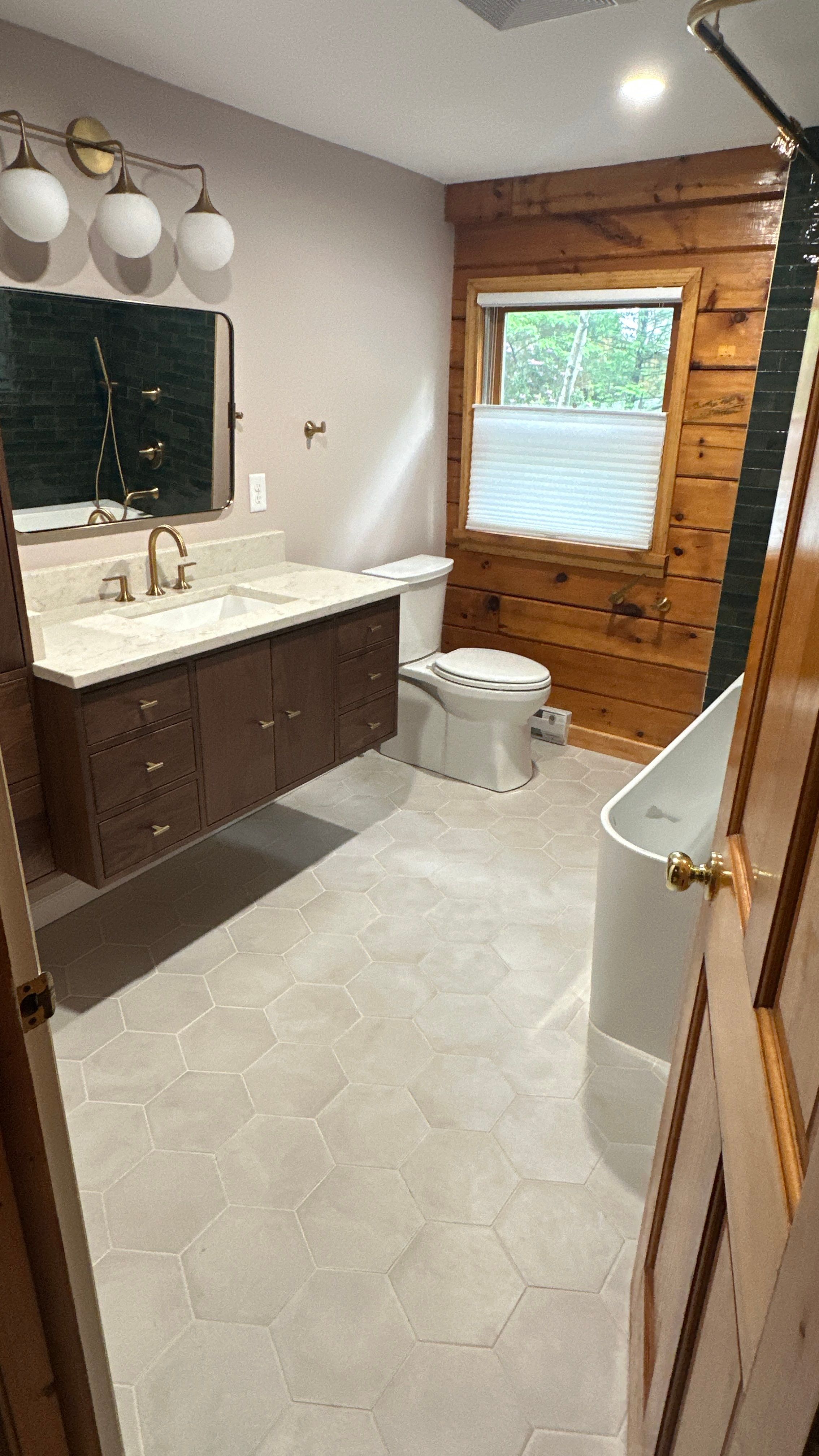Brandt Double Bathroom Remodel by Integrity Tile and Home LLC