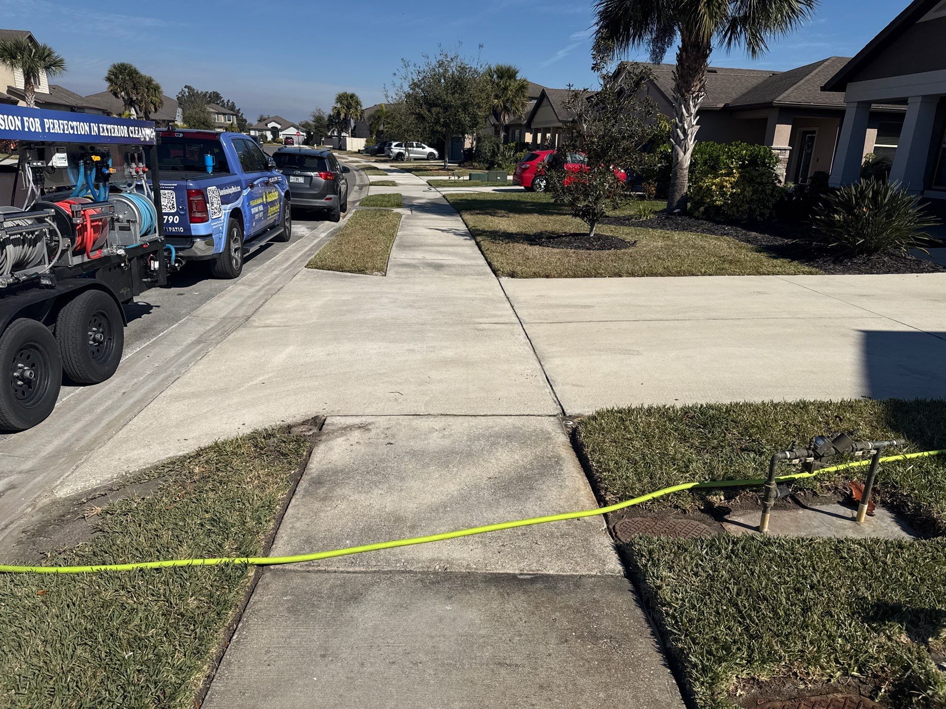 2-Car Concrete Driveway & Sidewalk Cleaning in Trevesta – Palmetto, FL by Sunshine AquaWash