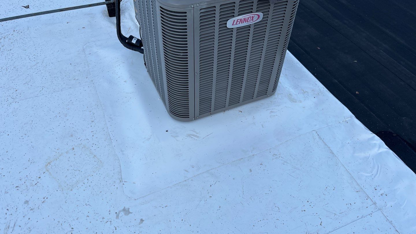 Residential ReRoofing Installation using Durolast by Top Notch Roofing Inc