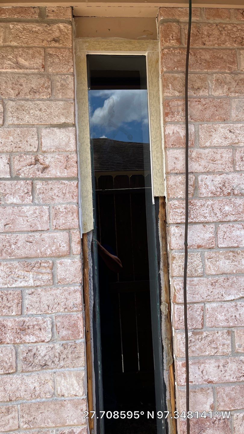 Colored Vinyl Windows to blend into brick by Bayfront Roofing and Construction