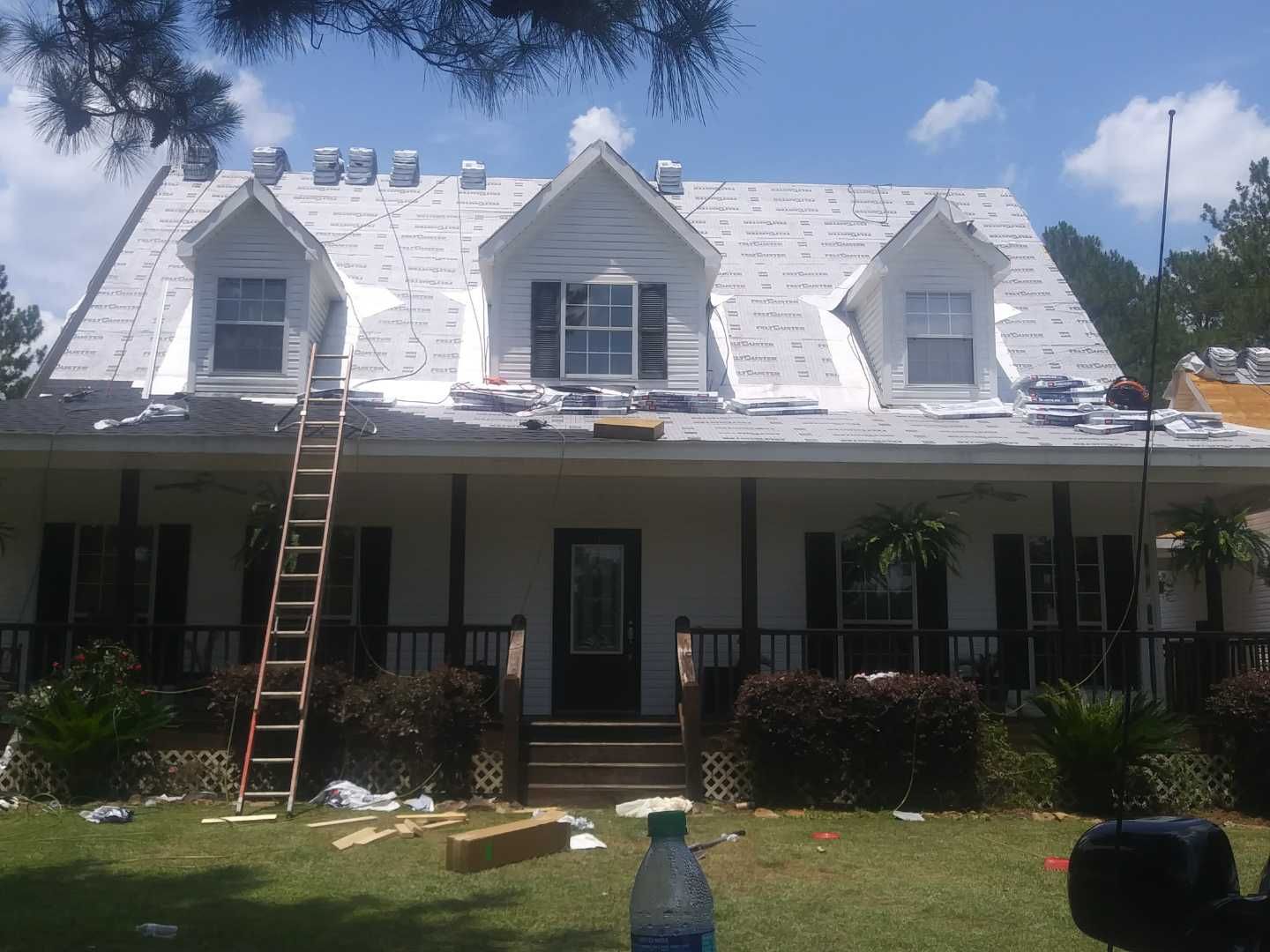 Residential Roofing Installation using Roof Replacement by American Roofing & Construction LLC