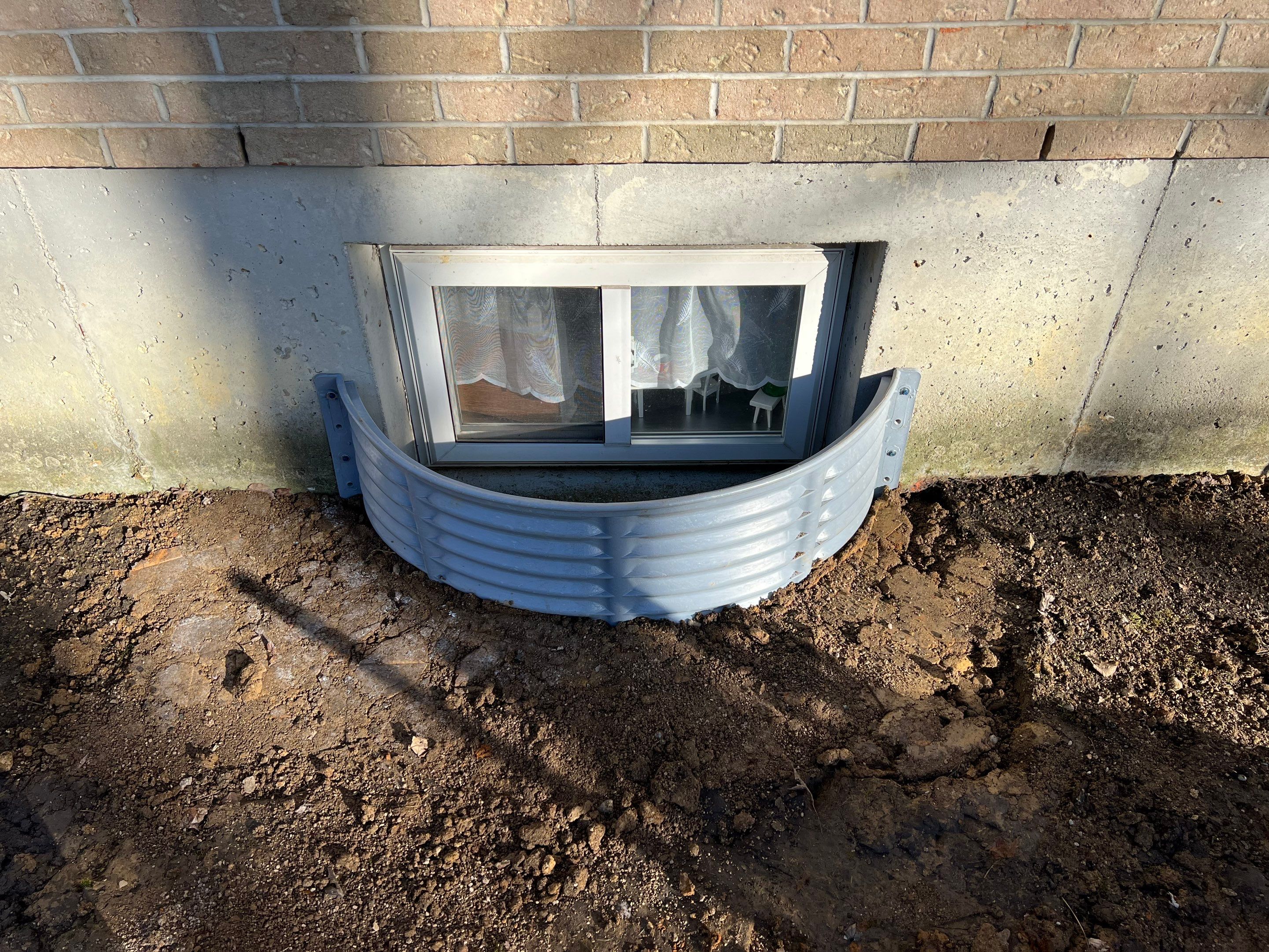 Window Well Replacement, Wall Repair, Grading by Reisenberg’s Lawn & Landscape, LLC