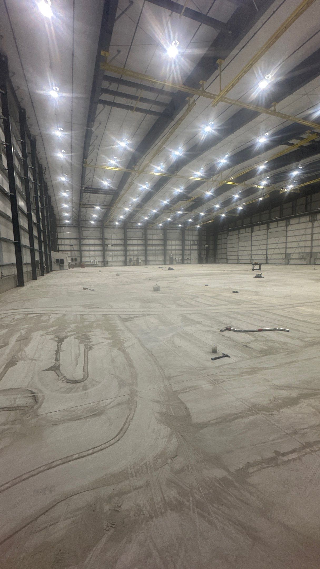 Airplane Hanger using Light Grey Commercial Penntek Epoxy by Croc Coatings, LLC