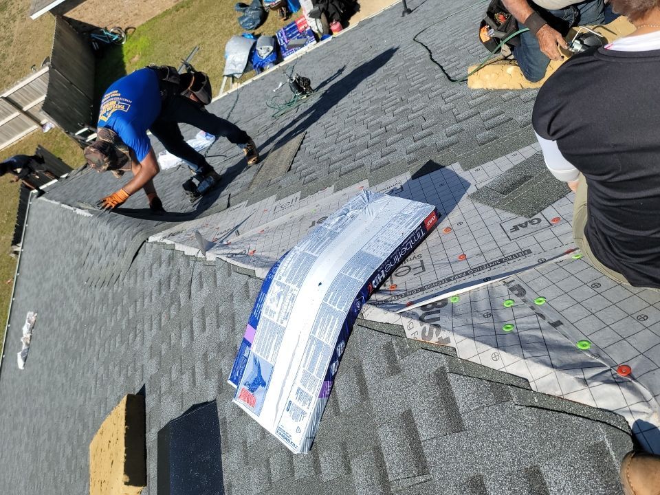 Residential Roofing Installation using Roof Replacement by American Roofing & Construction LLC