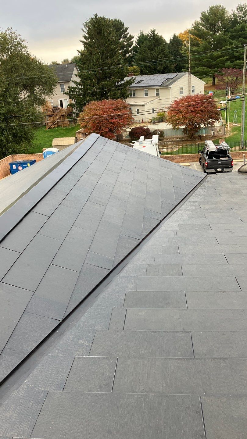 Tesla Solar Roof on a Commercial Building by American Home Contractors