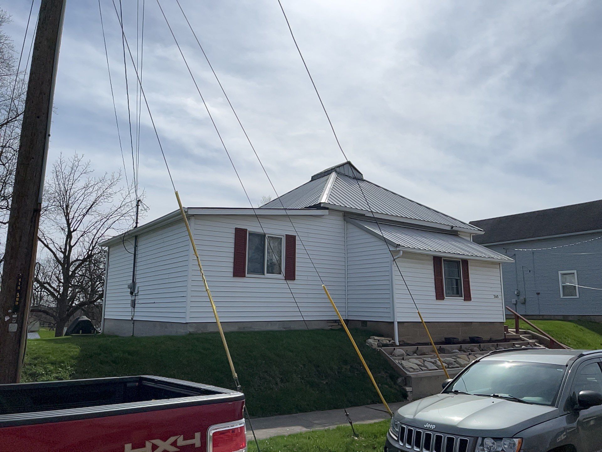Residential Roofing Installation using Exposed Fastener Metal Roof by 4Ever Metal Roofing