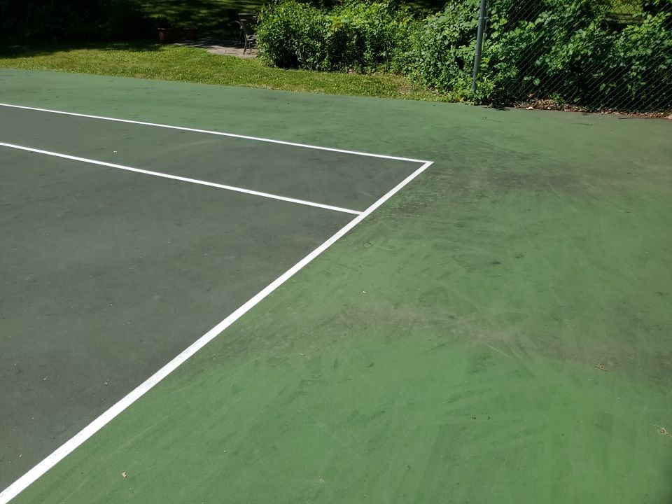 Deck, Patio, and Tennis Court Cleaning by Northern Power Washing LLC.