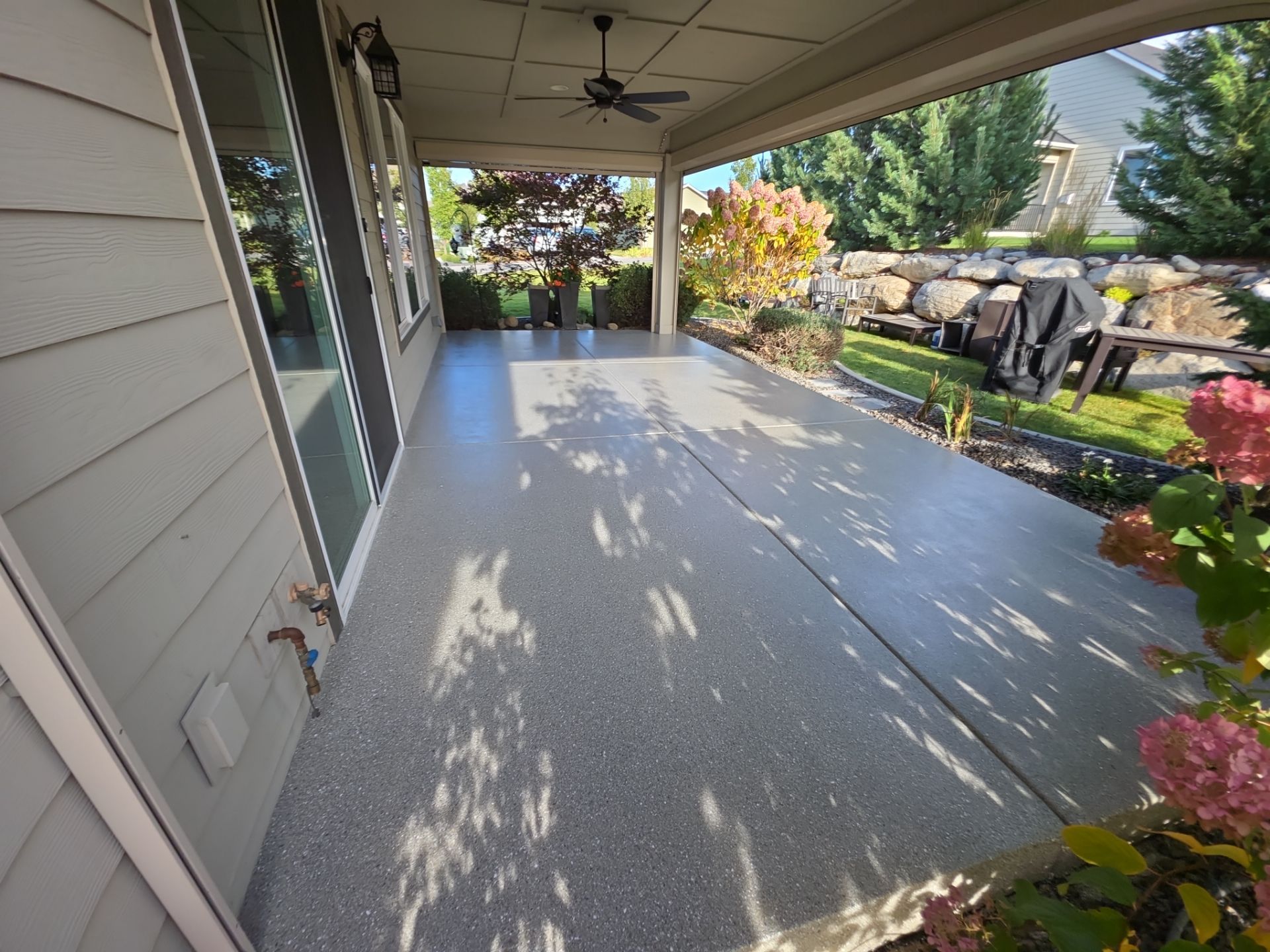 Front Porch and Back Patio Concrete Transformation in Liberty Lake by Croc Coatings, LLC