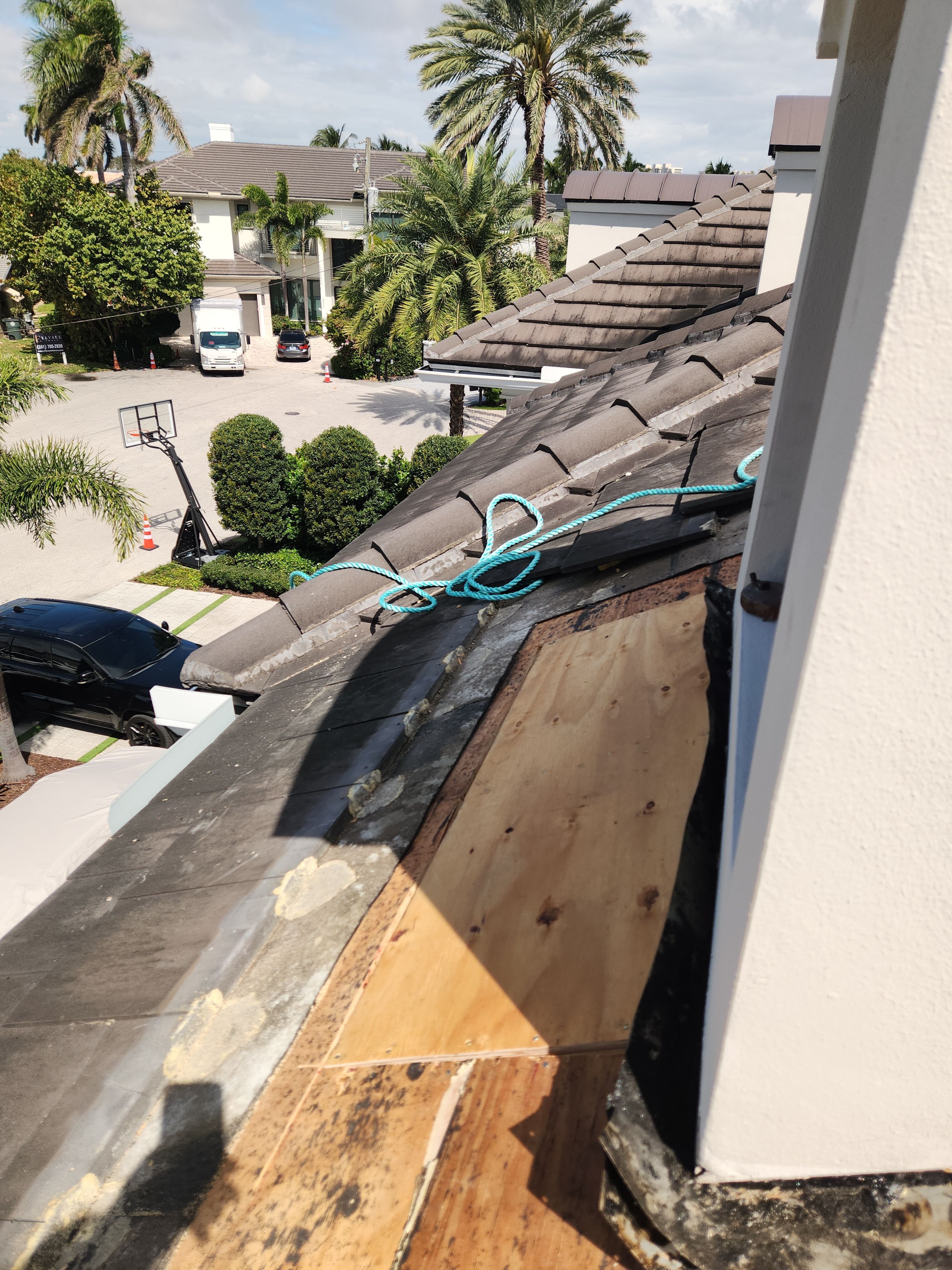 Silicone roof coating and tile tune up in Boca Raton by Aastro Roofing