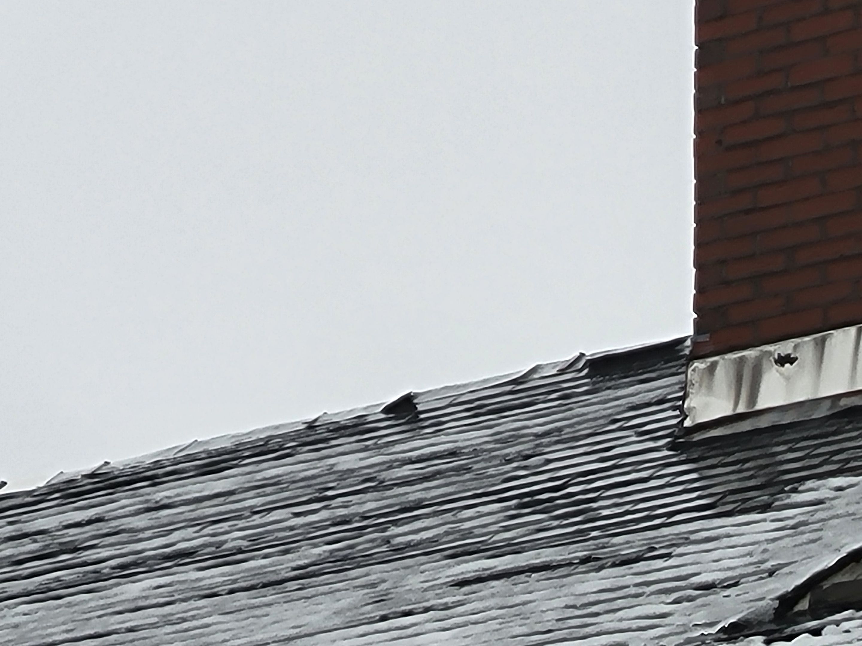 Slate Roof Repair using All Natrual Slate Tiles by The B.A.R Roofing