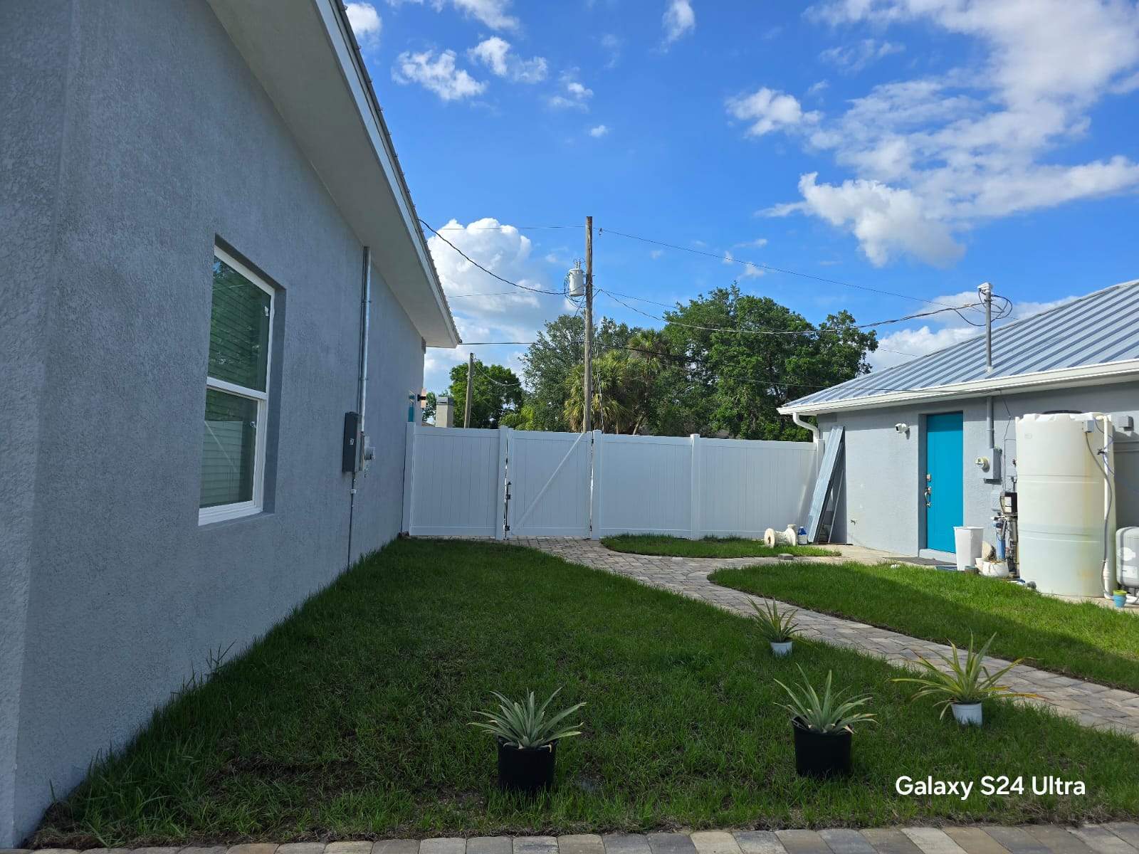 Residential White Vinyl Privacy Fence Installation in North Port by True Fence LLC