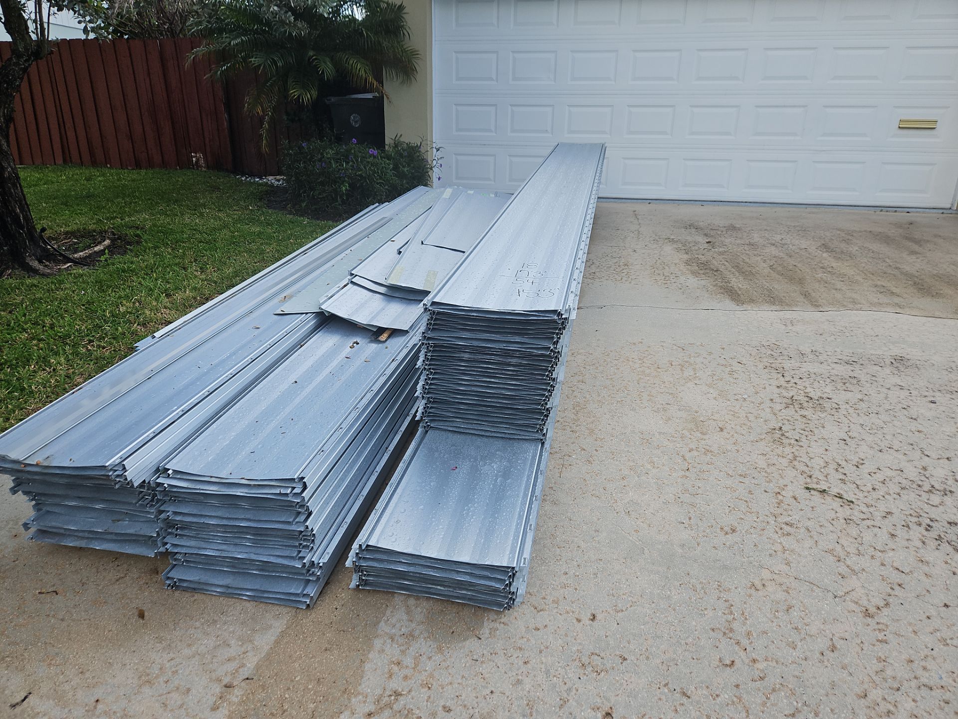 Residential Roofing Installation using 1" Nail strip metal roof by BLUES BROTHERS ROOFING