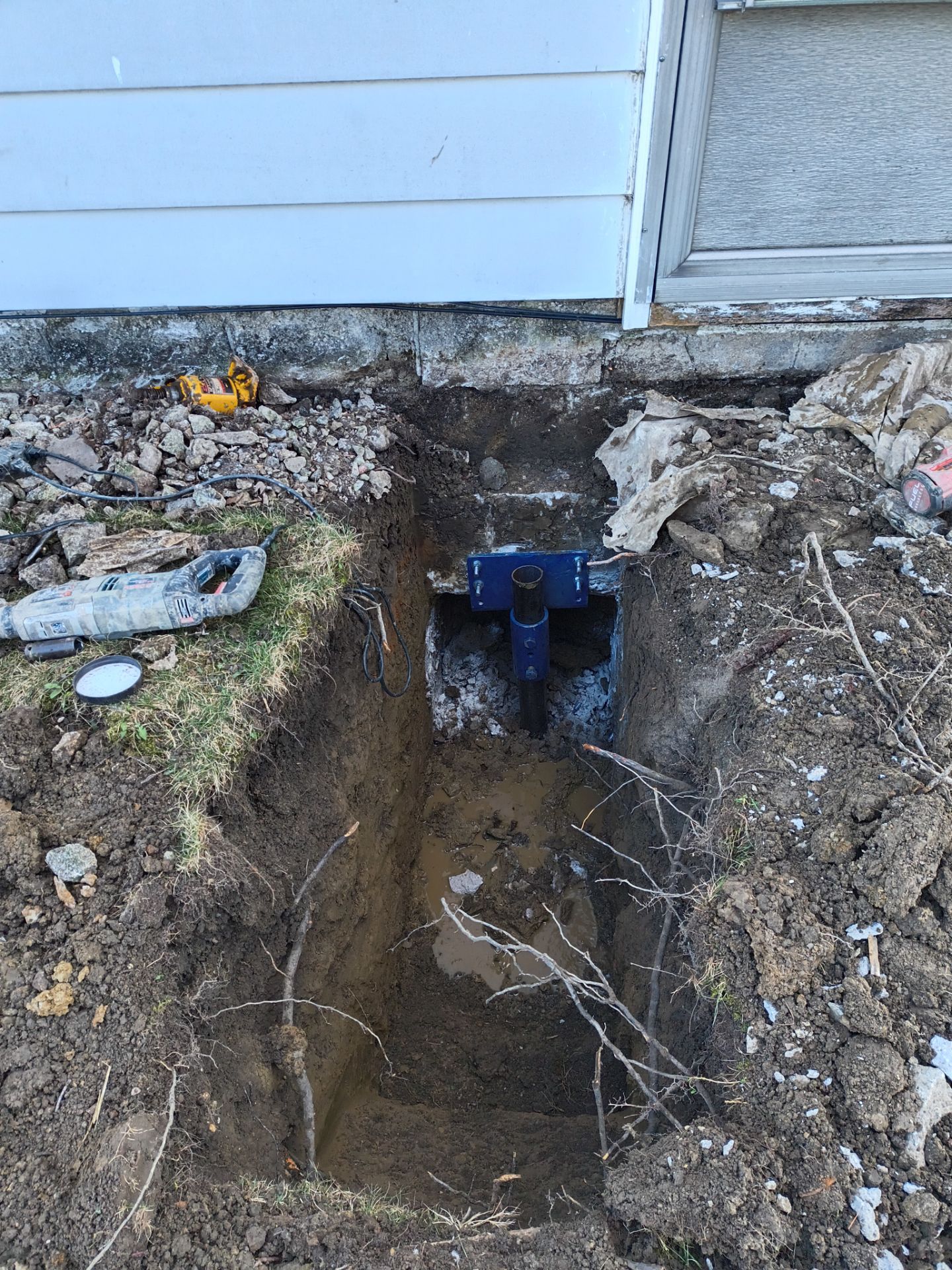 Helical Piers & Parge Coating by Toledo Basement Repair 