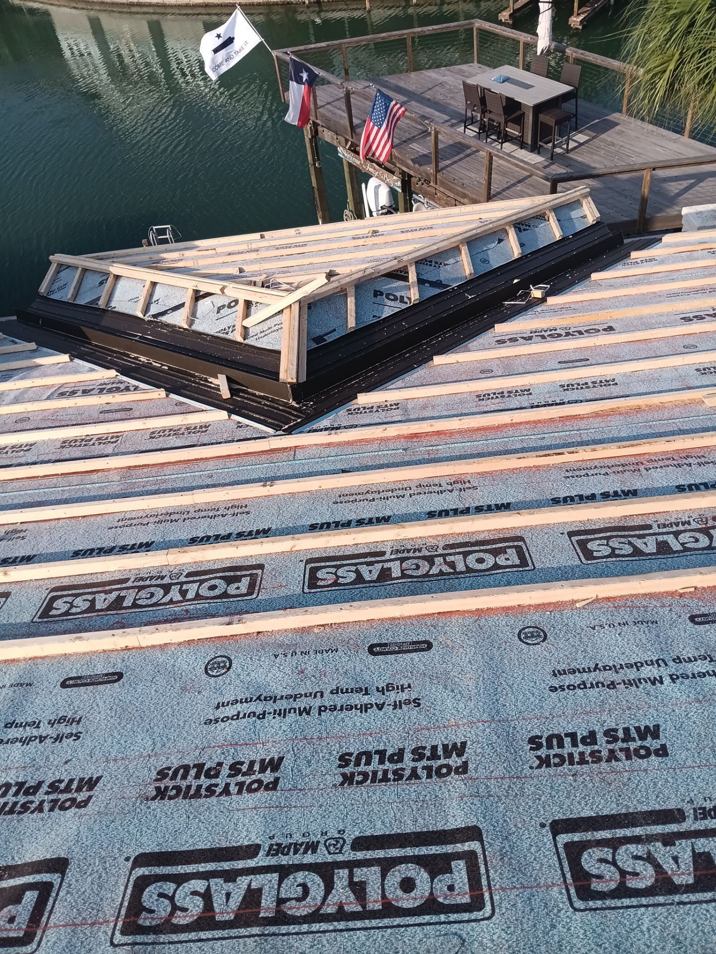 Off with the Tile and on with the TILCOR stone coated metal.  by Bayfront Roofing and Construction