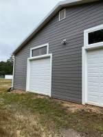 Siding Installation using JH CedarMill Plank STMT by ExteriorPros