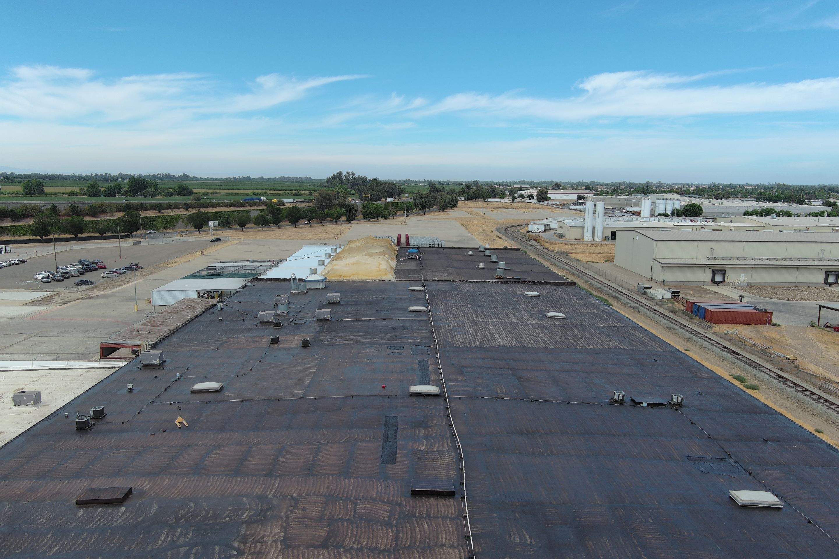 Pro Farms Spray foam roofing project by Straight Edge Roofing Inc