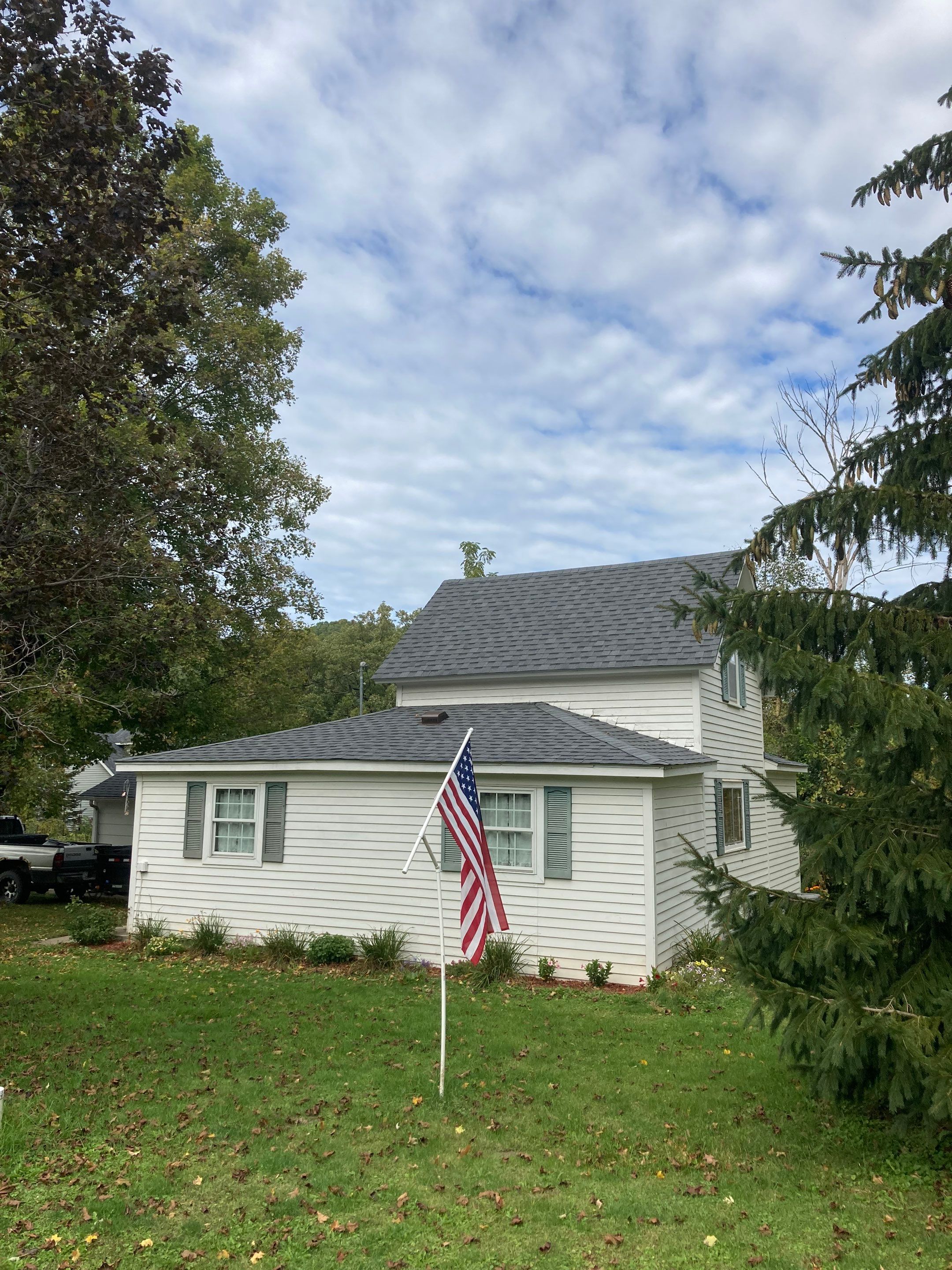 roof replacement on a garage and home by Reasonable Contracting LLC