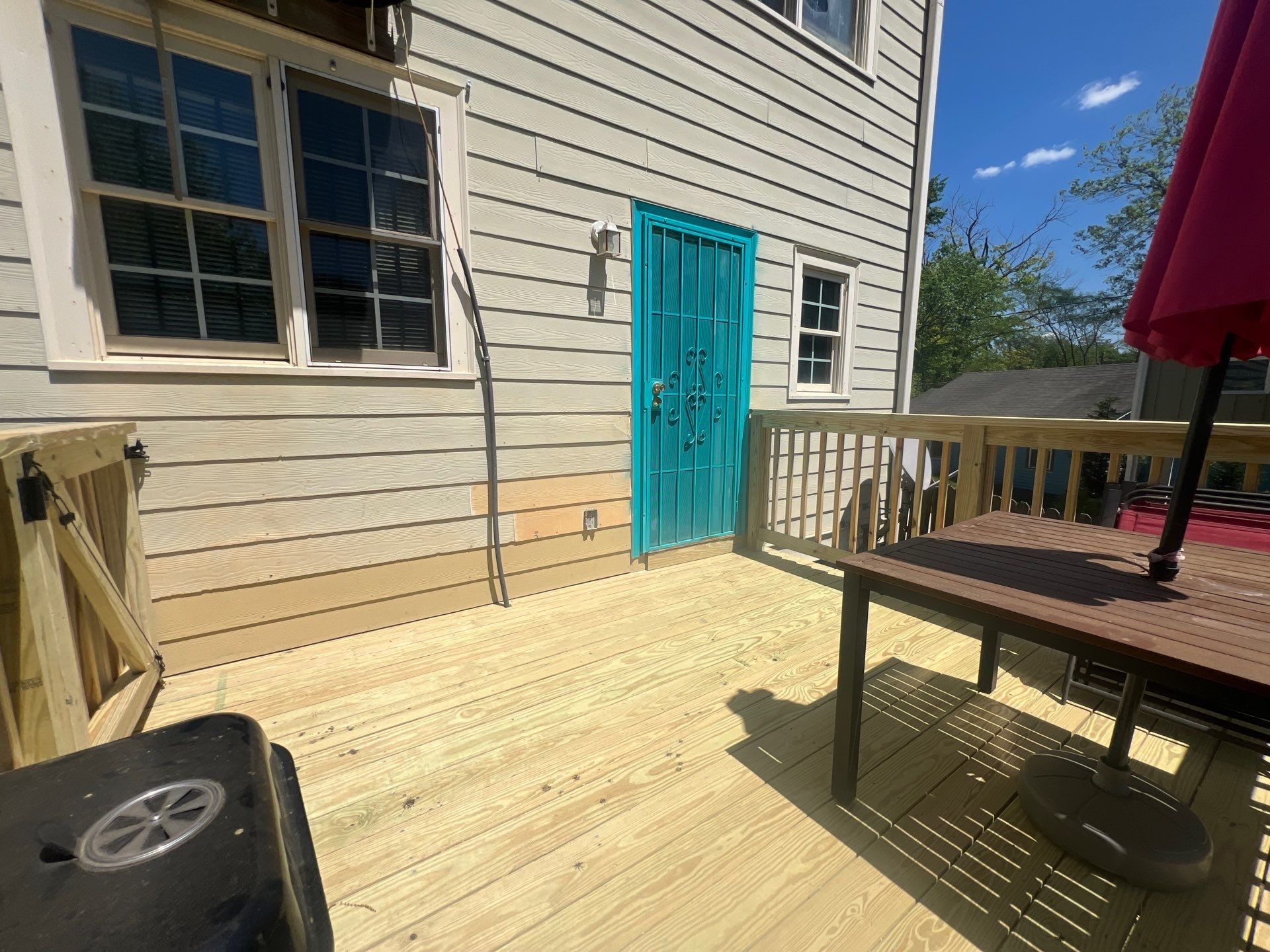 Pressure-Treated Wood Deck and Staircase Replacement in Atlanta by Swift Home Renovations