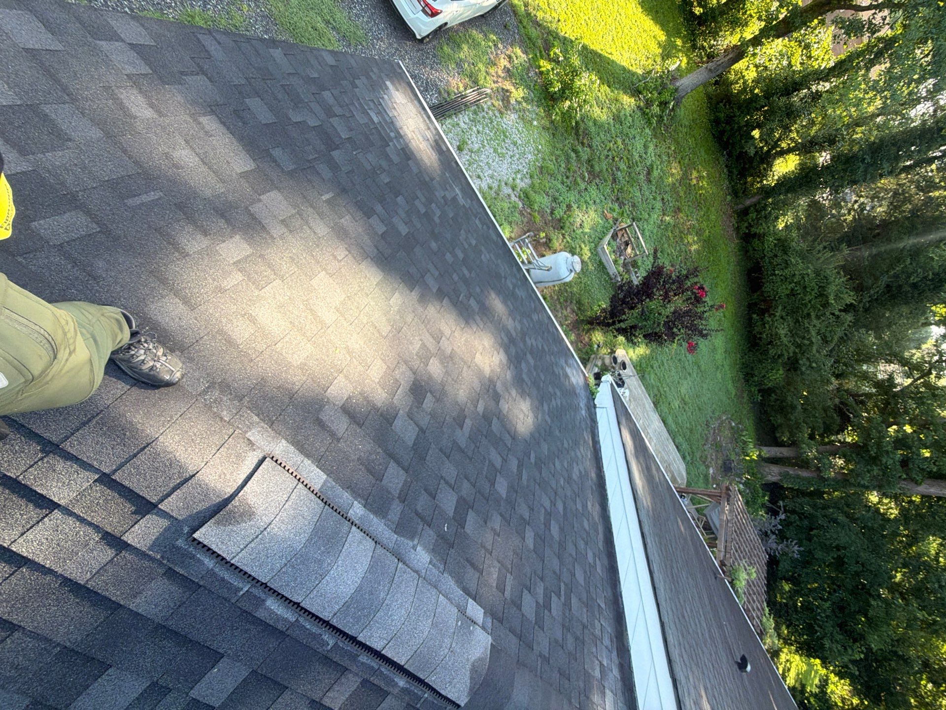 Asphalt Shingle Roof Replacement and Gutter Installation in Richmond by Cade Construction