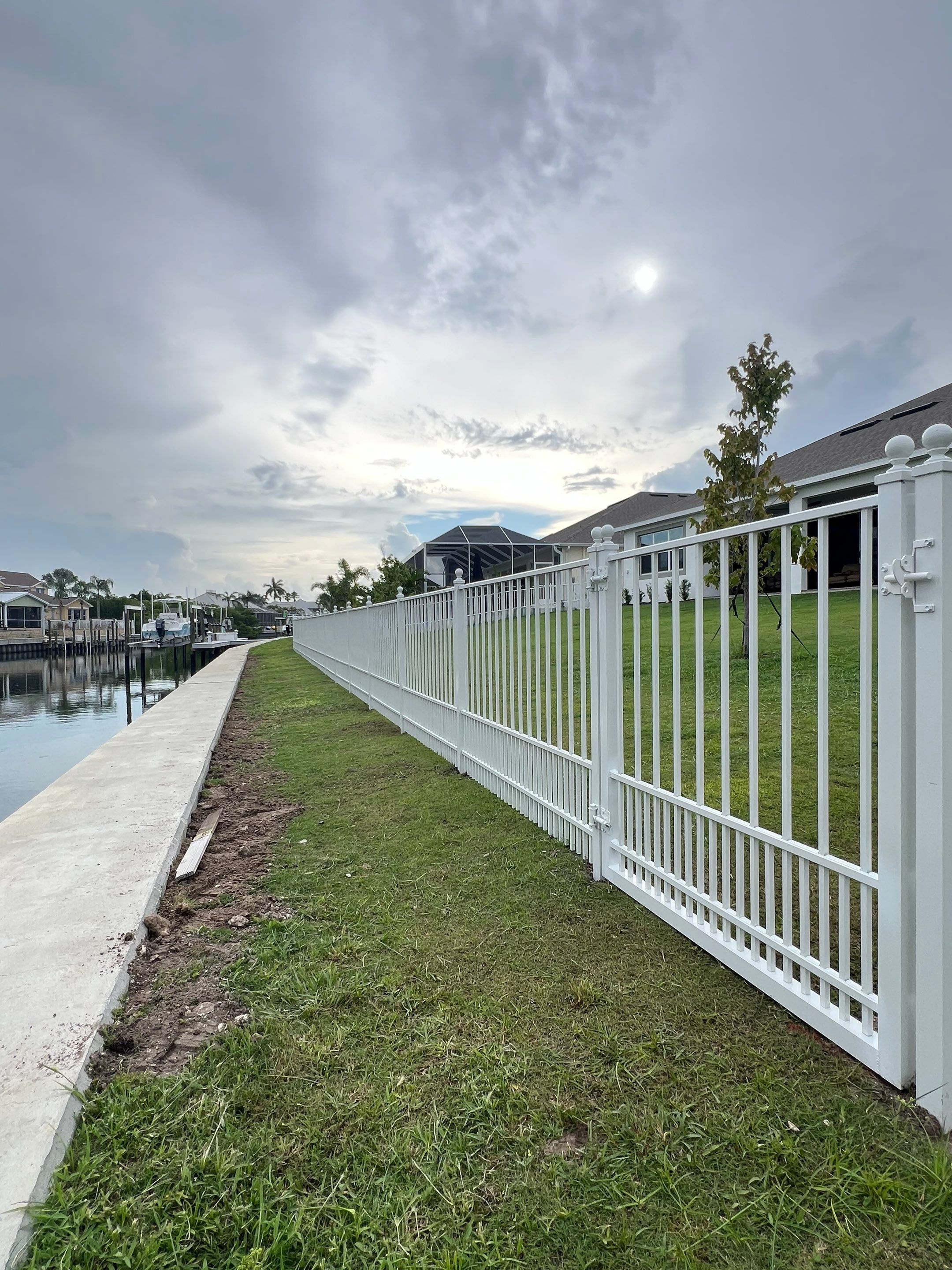 Aluminum Fence Installation using White Aluminum Puppy Picket Fence by Asap fence and gates, LLC