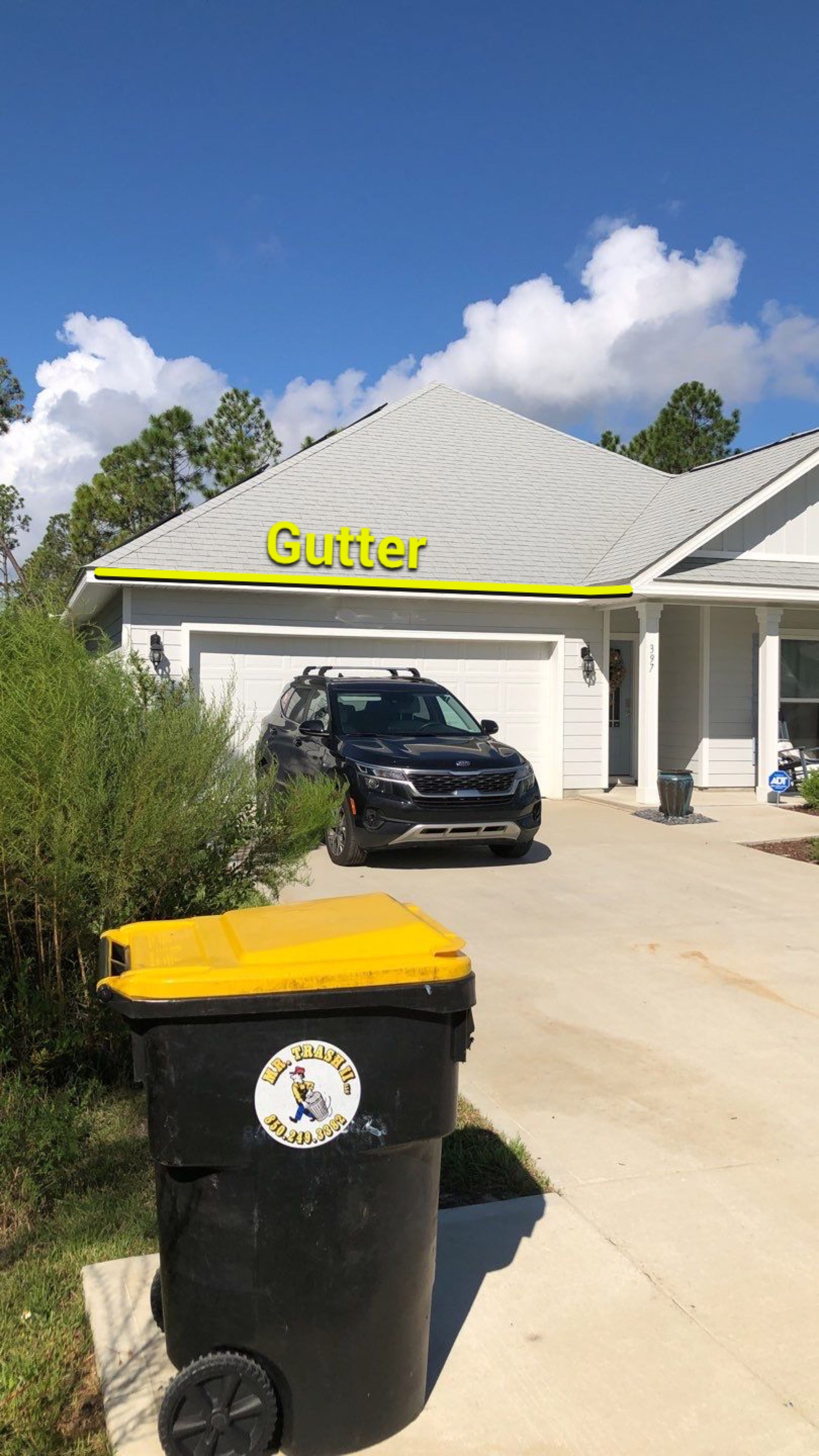 Seamless Gutter Installation using White by Gutter Professors