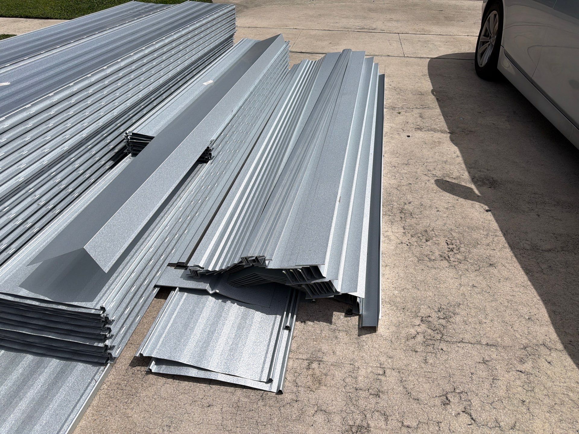 Residential Roofing Installation using 1" Nail strip metal roof by BLUES BROTHERS ROOFING