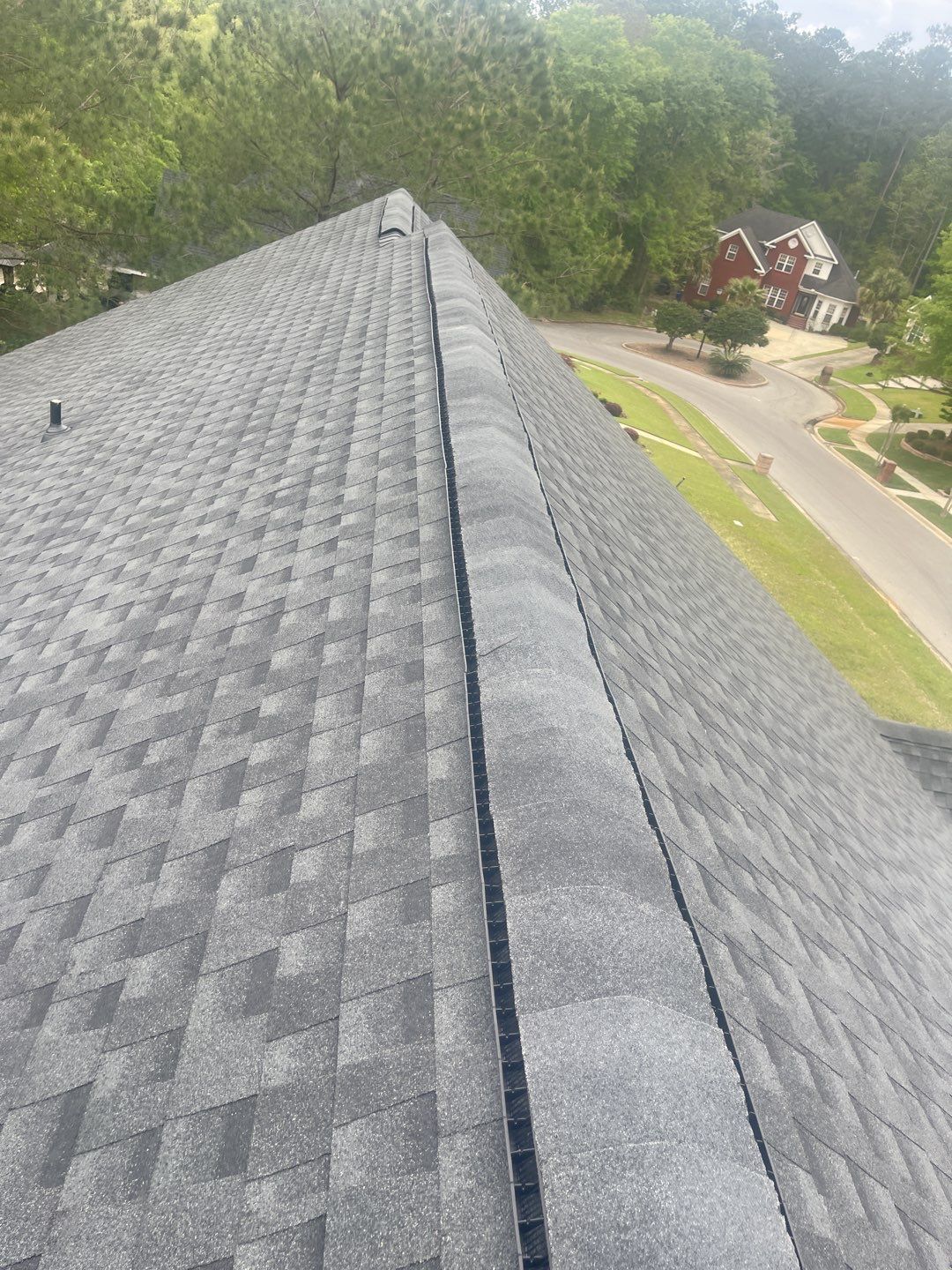 Residential Roofing Installation using Roof Replacement by American Roofing & Construction LLC