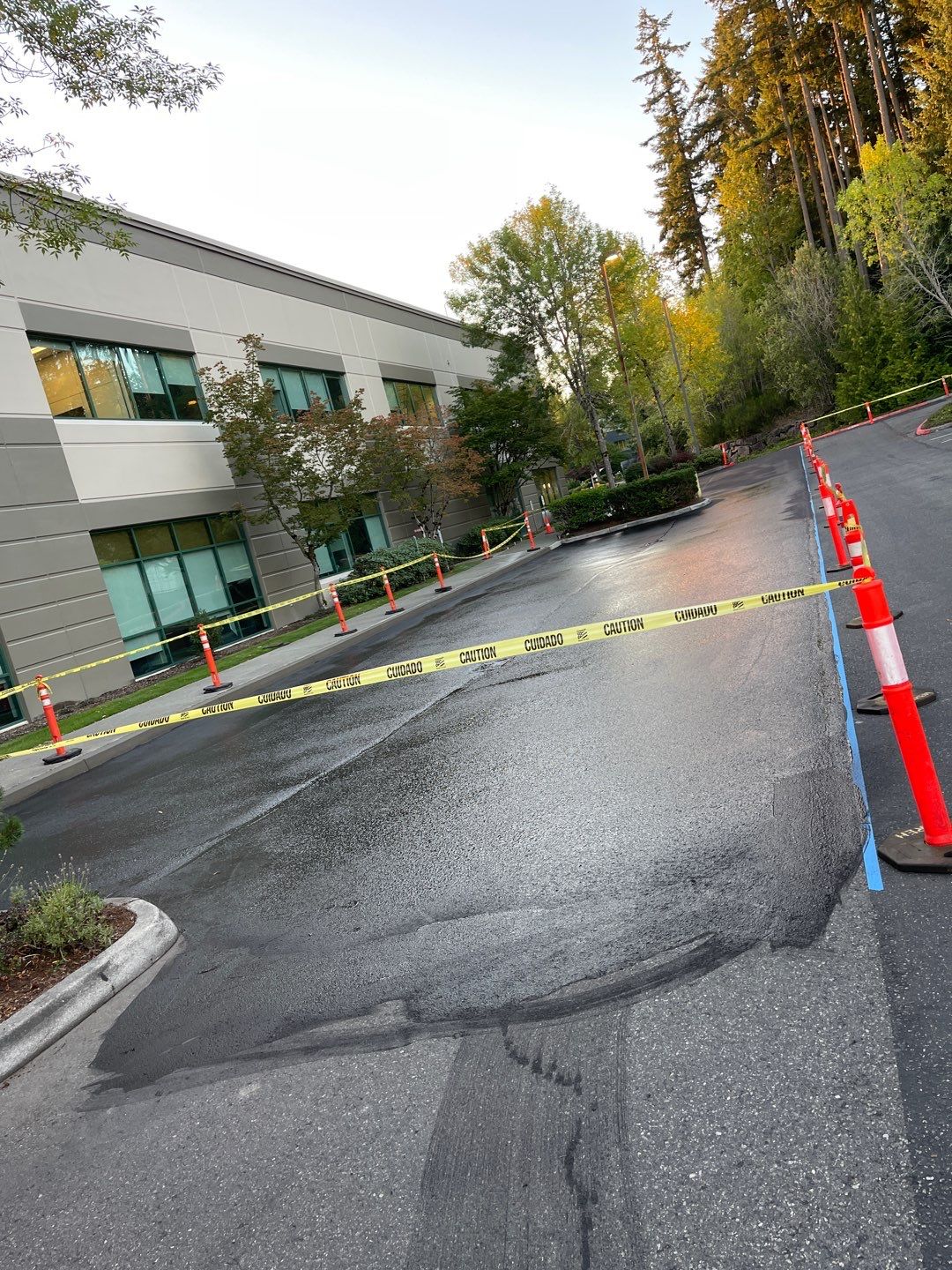 Kidder Matthews | Parking Lot Sealcoating & Striping with Concrete Curb & Patch Repairs  by Jireh Asphalt & Concrete Inc 