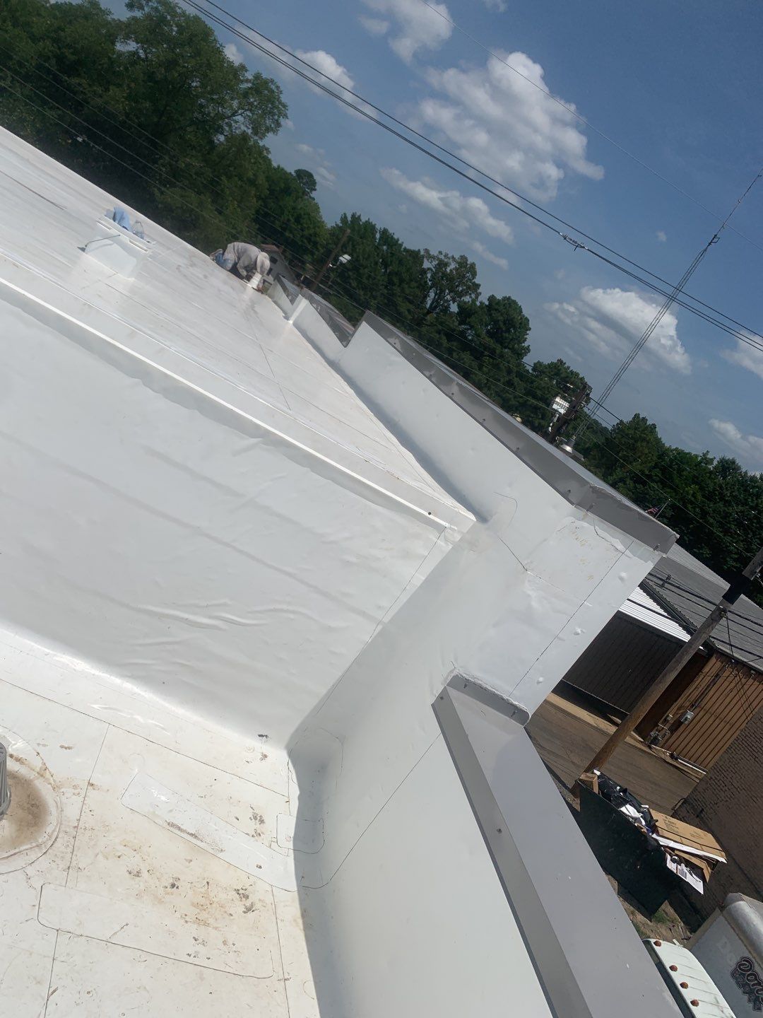 Commercial Roofing Installation in DeQueen, AR, using 50 mil PVC by Hostetler Roofing