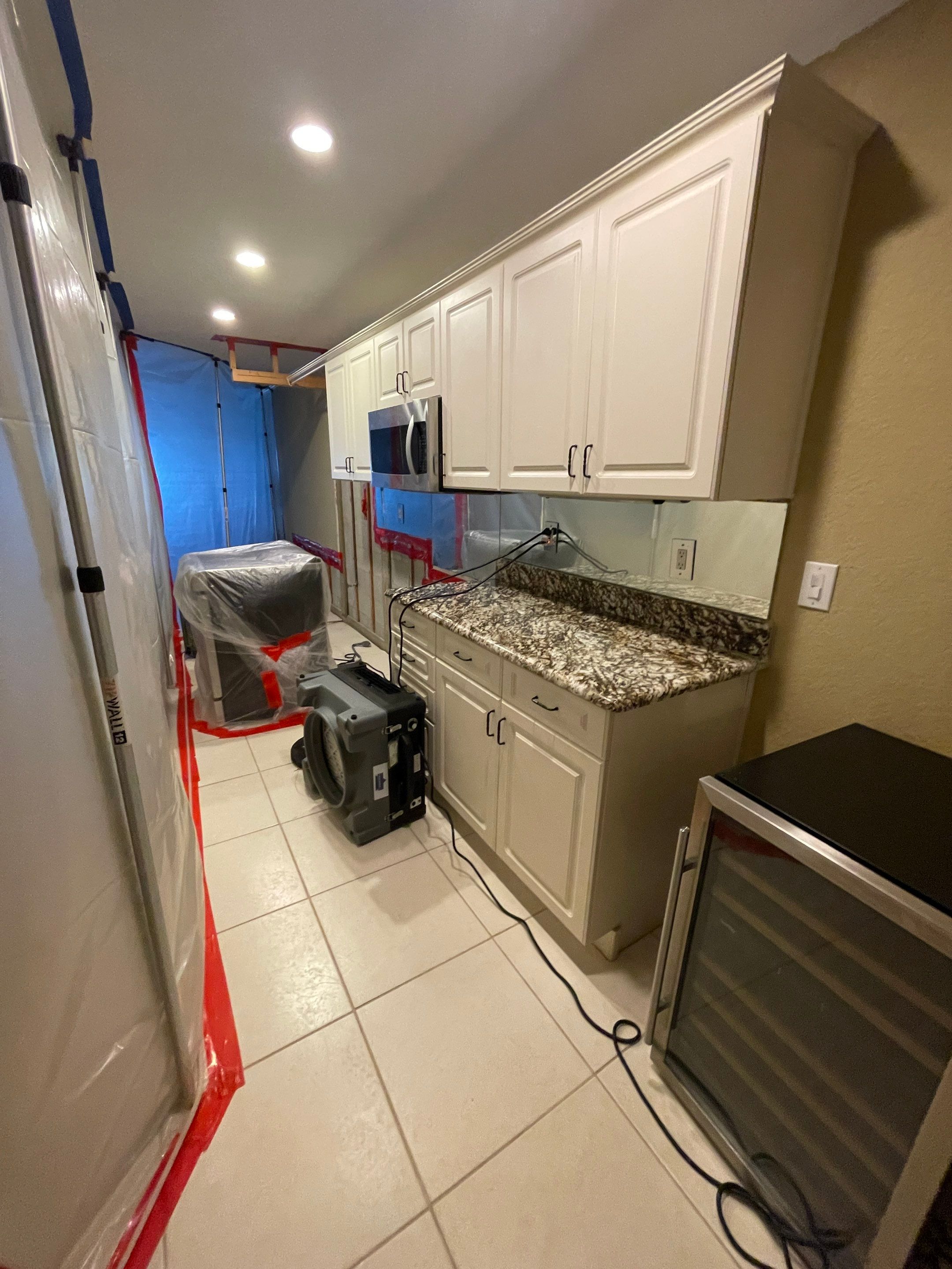 Mold remediation and rebuild of kitchen and living areas by Bay Coast Restoration 